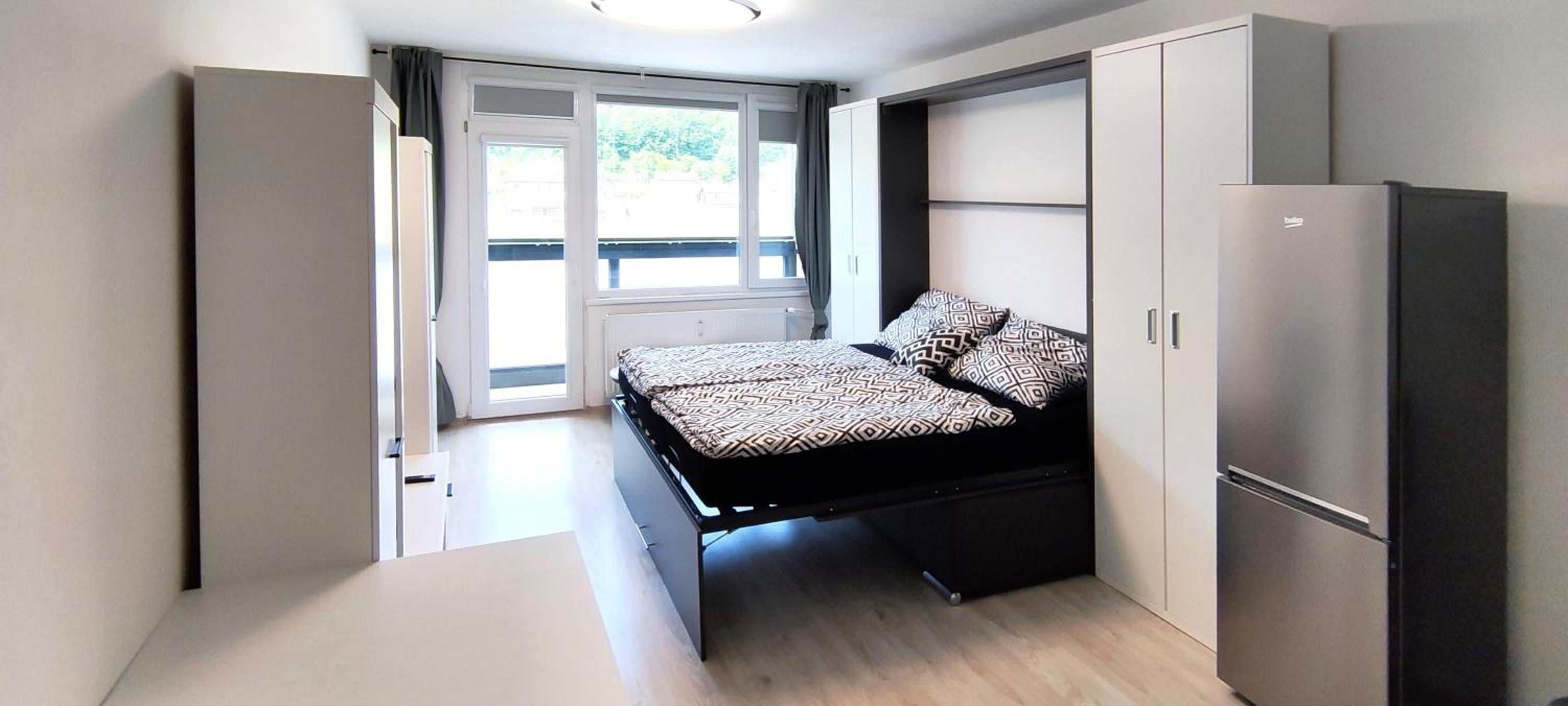 Apartment with Balcony - Photo 2