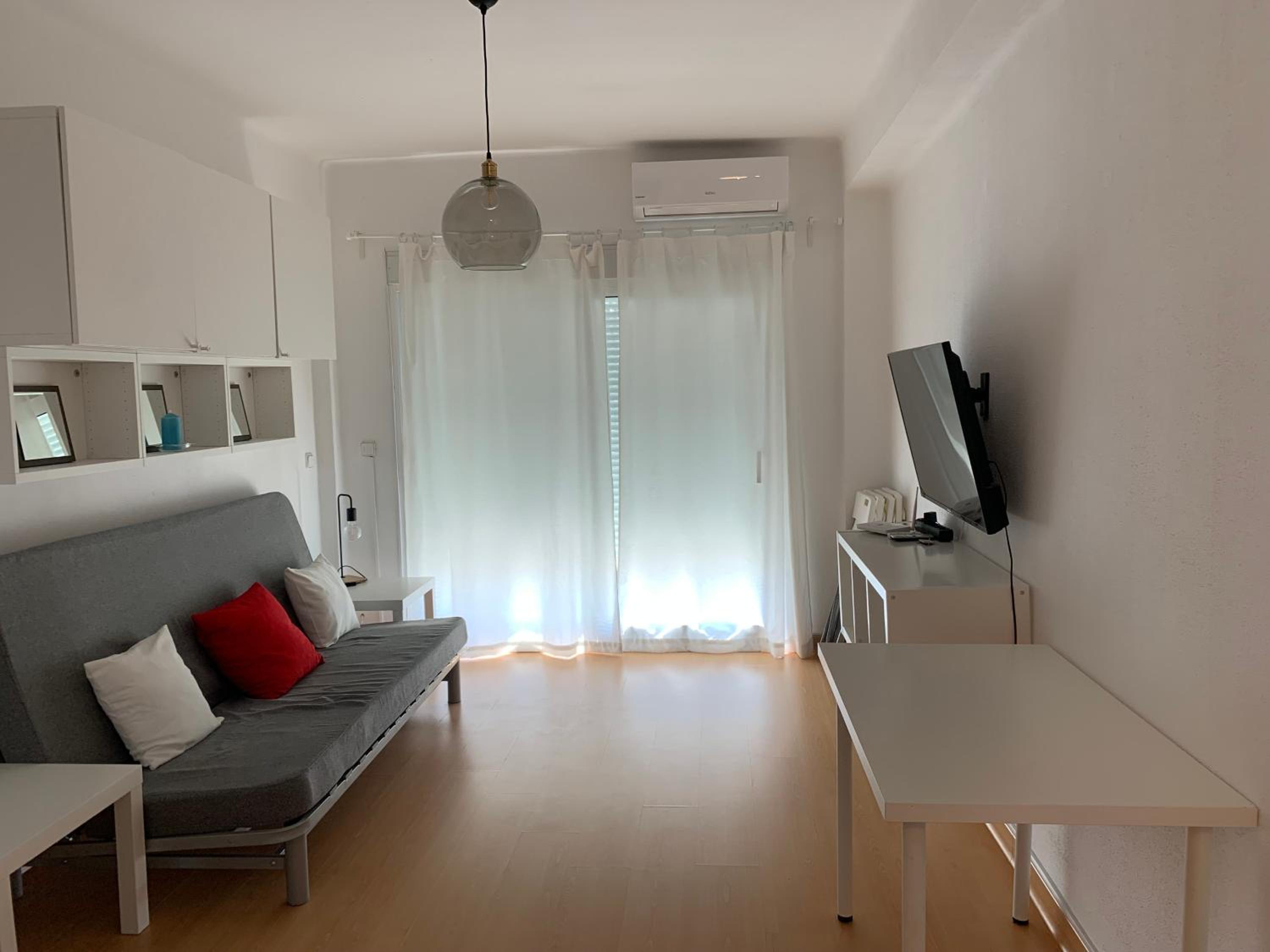 Estudio con sofá cama