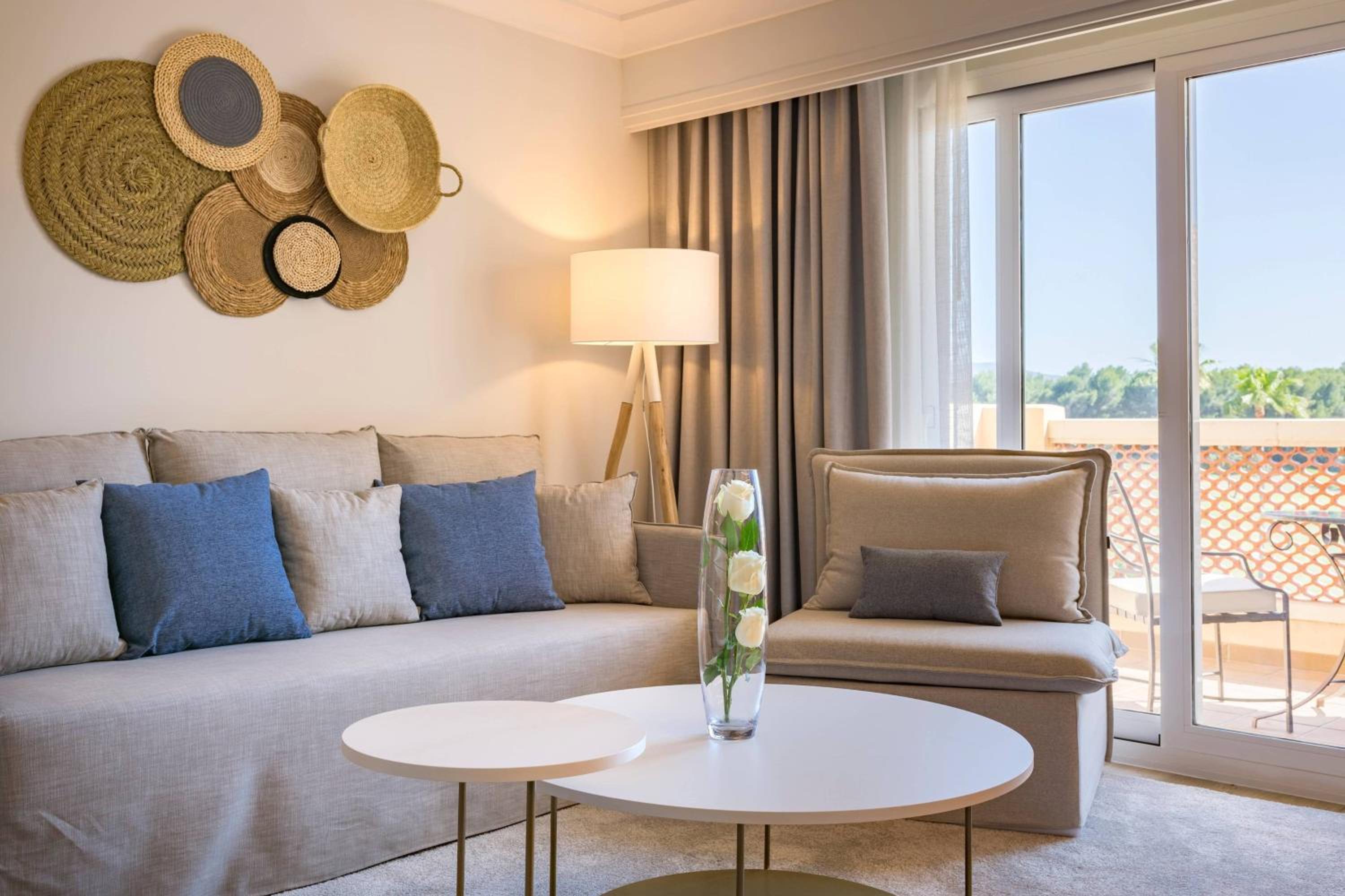 King Suite with Sofa Bed, Balcony and Resort View