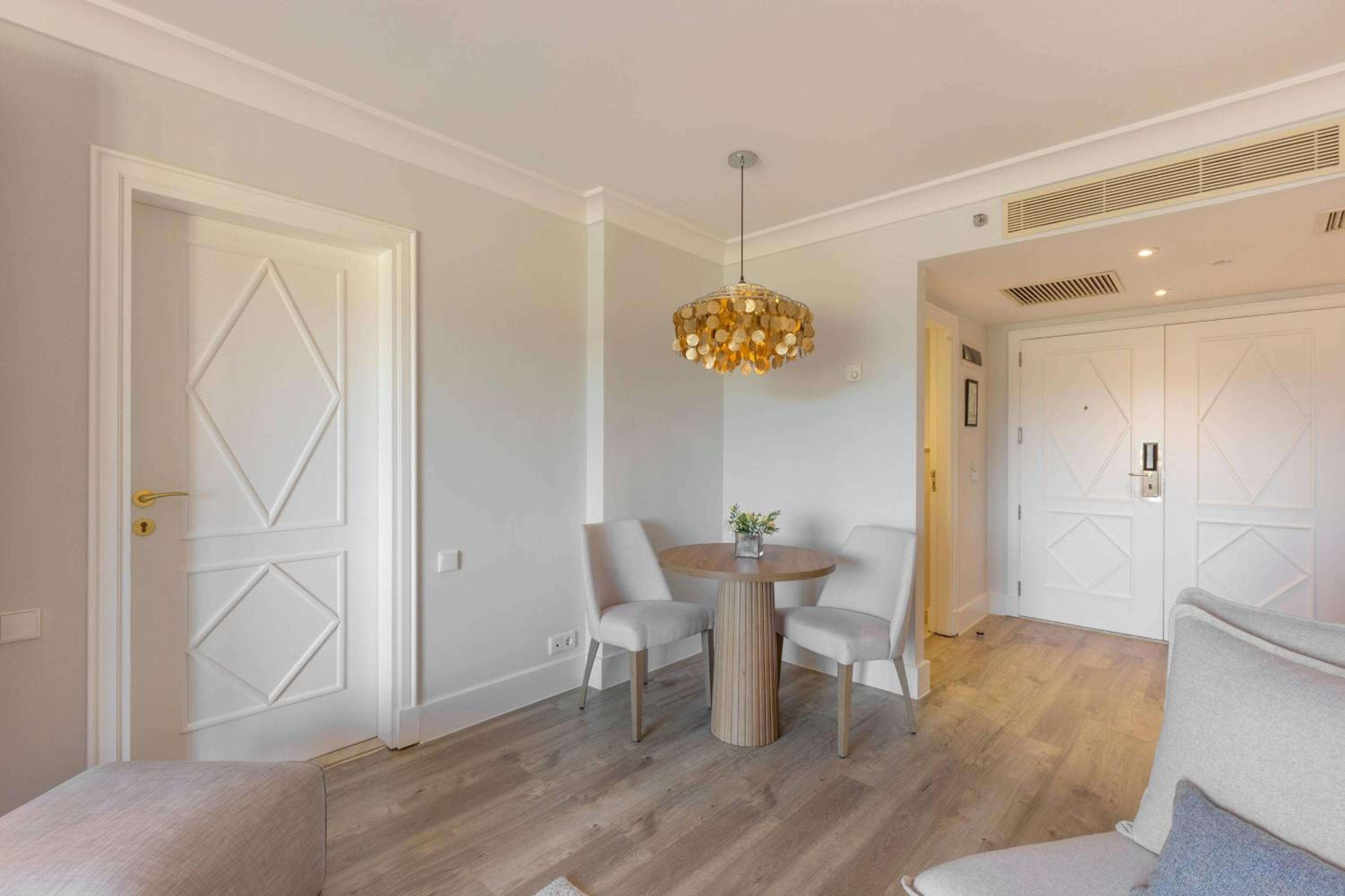 Standard King Suite with Sofa Bed, Balcony and Inland View