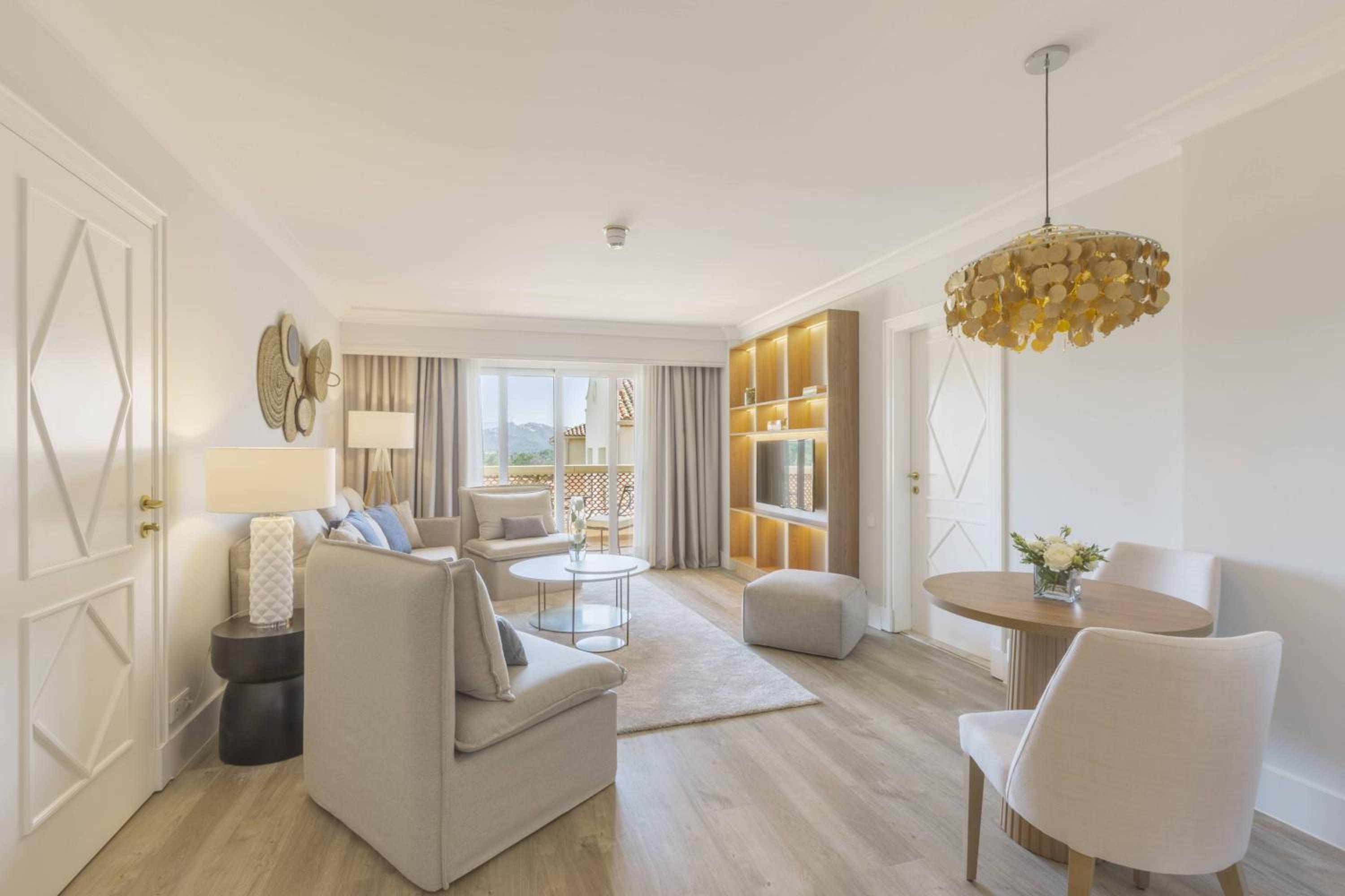 King Suite with Sofa Bed, Balcony and Resort View