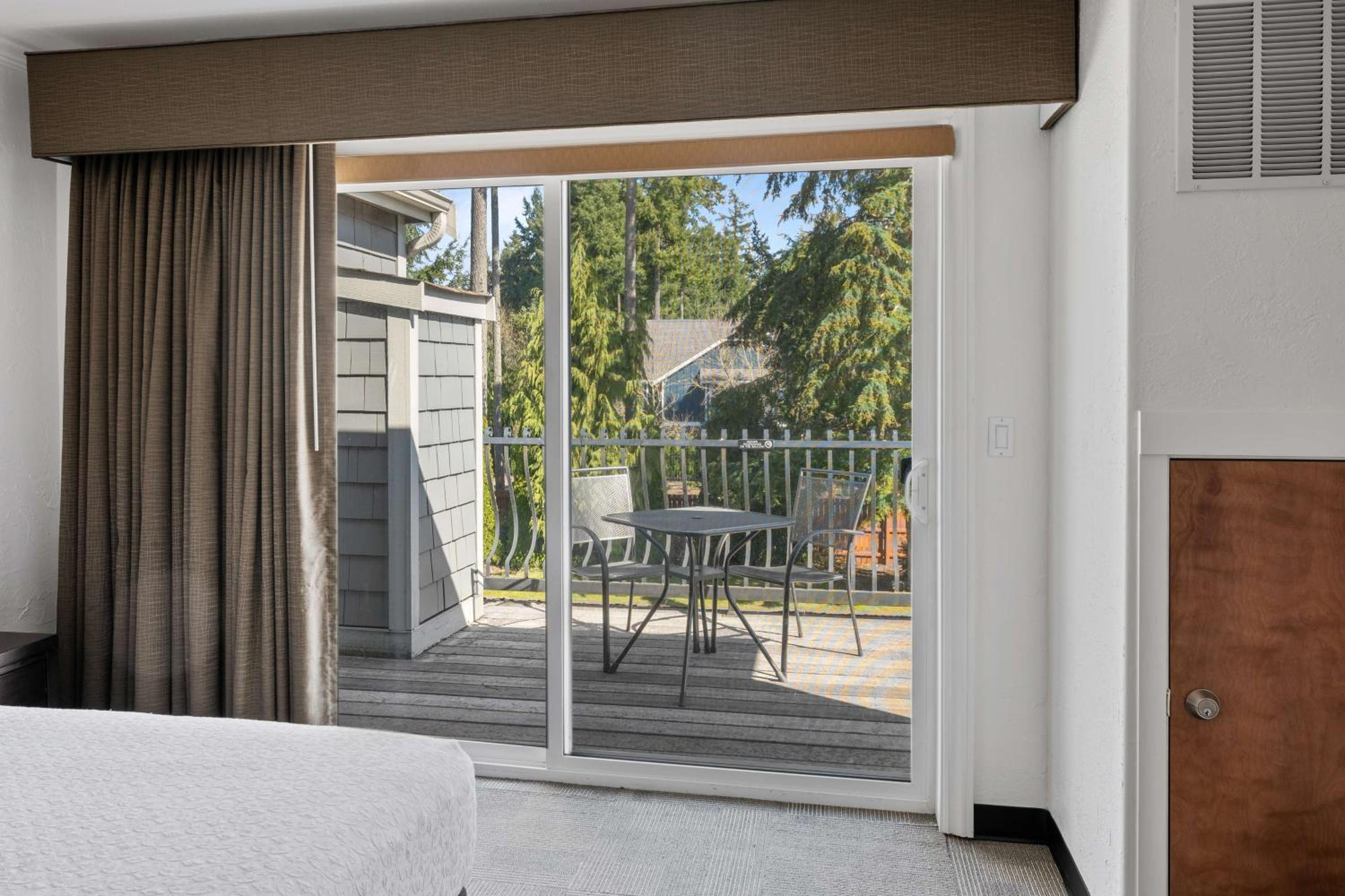 King Suite with Balcony- Non-Smoking - Photo 8
