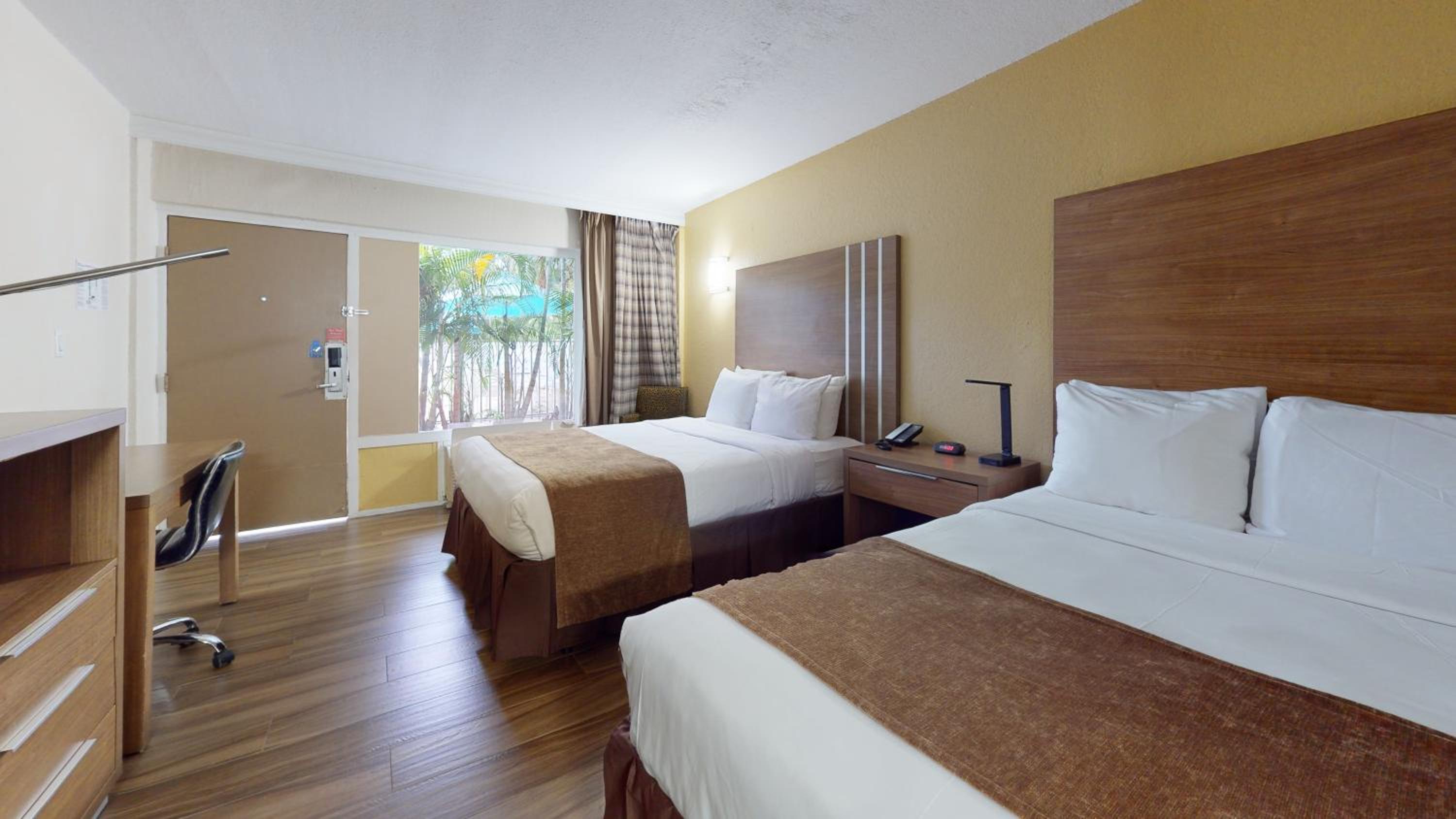Queen Room with Two Queen Beds - Non Smoking - Photo 1