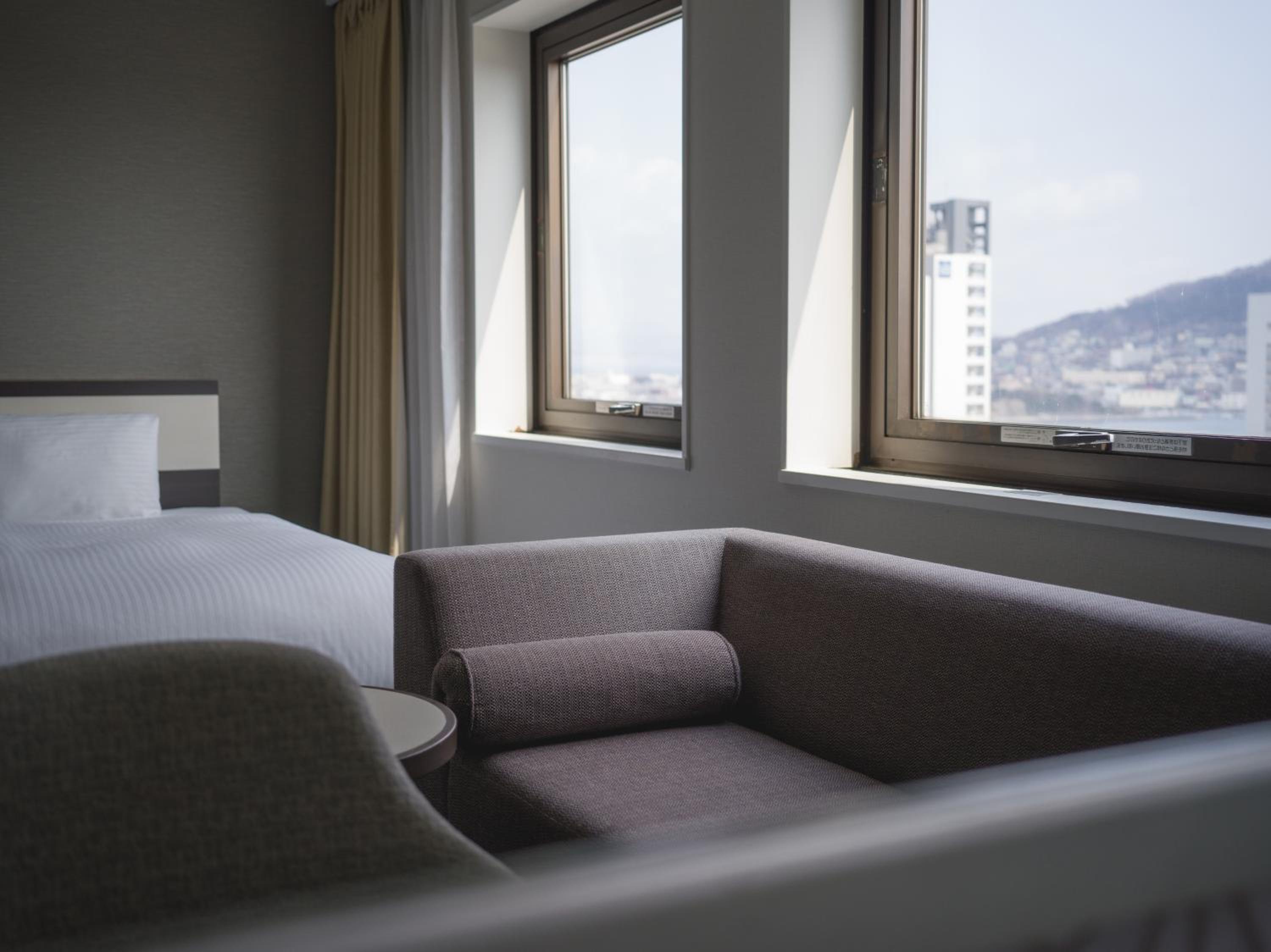 Twin Room - Non-Smoking - Photo 10