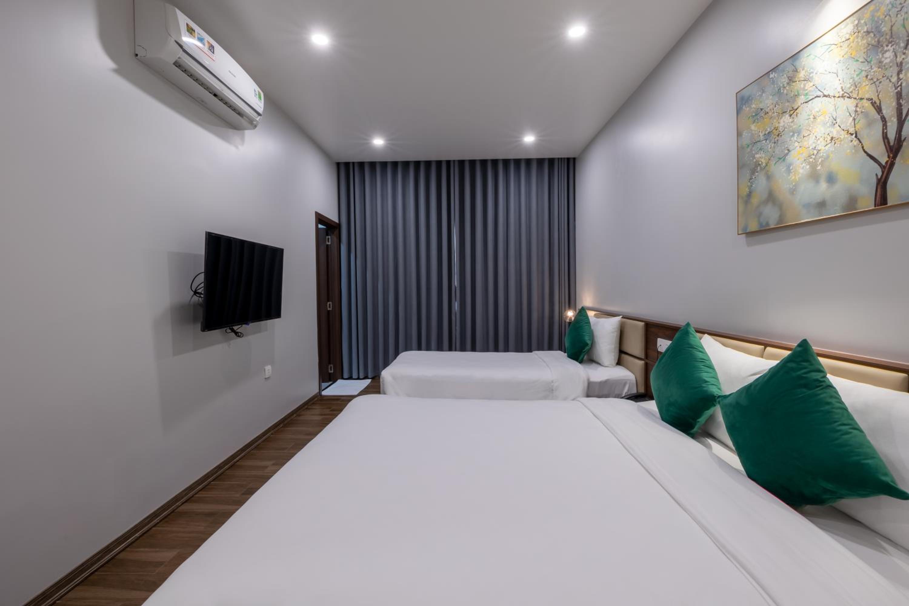 Deluxe Triple Room