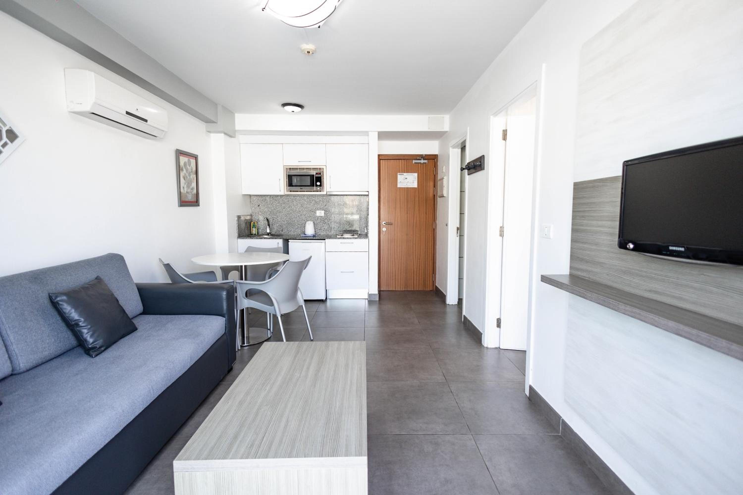Apartment with Balcony - Photo 6