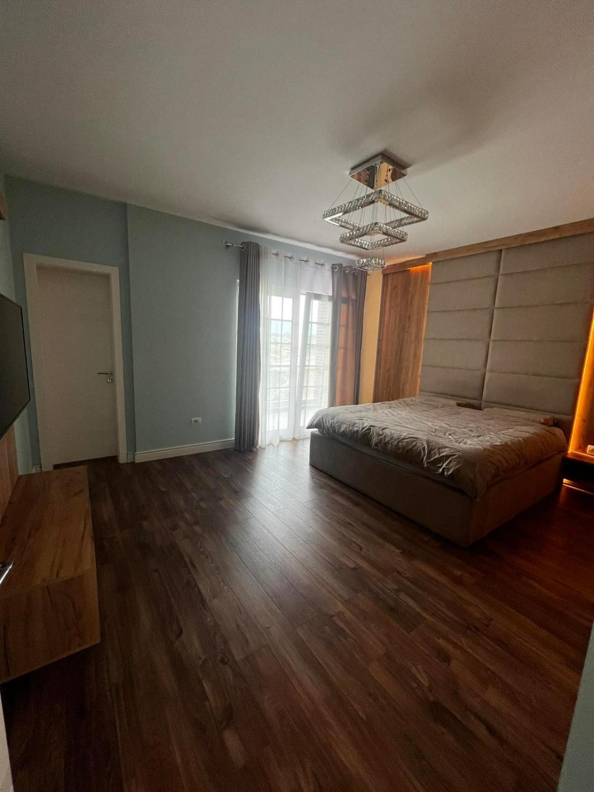 Three-Bedroom Apartment photo 1