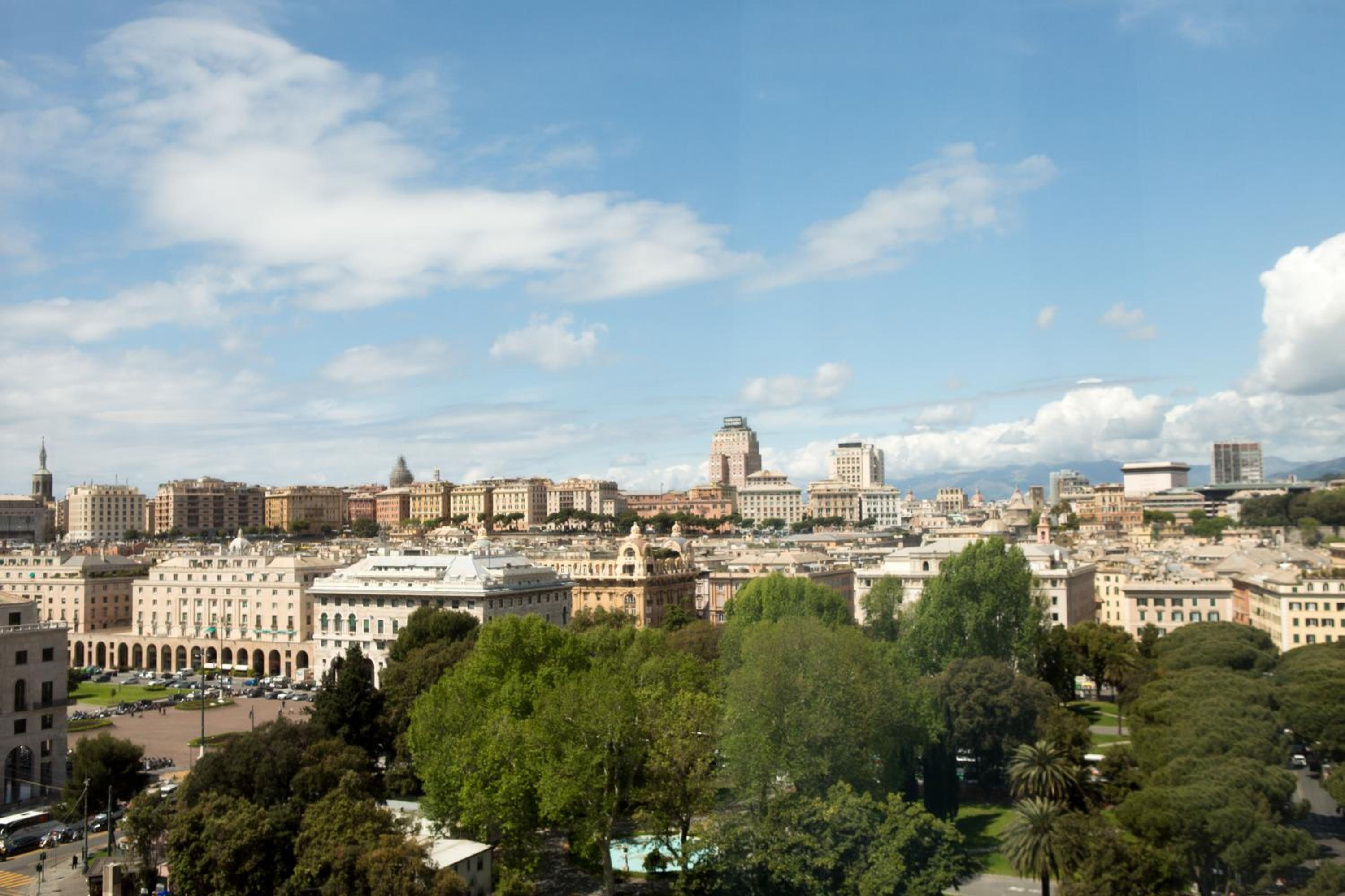 Breathtaking cityscape awaits from your room's window!