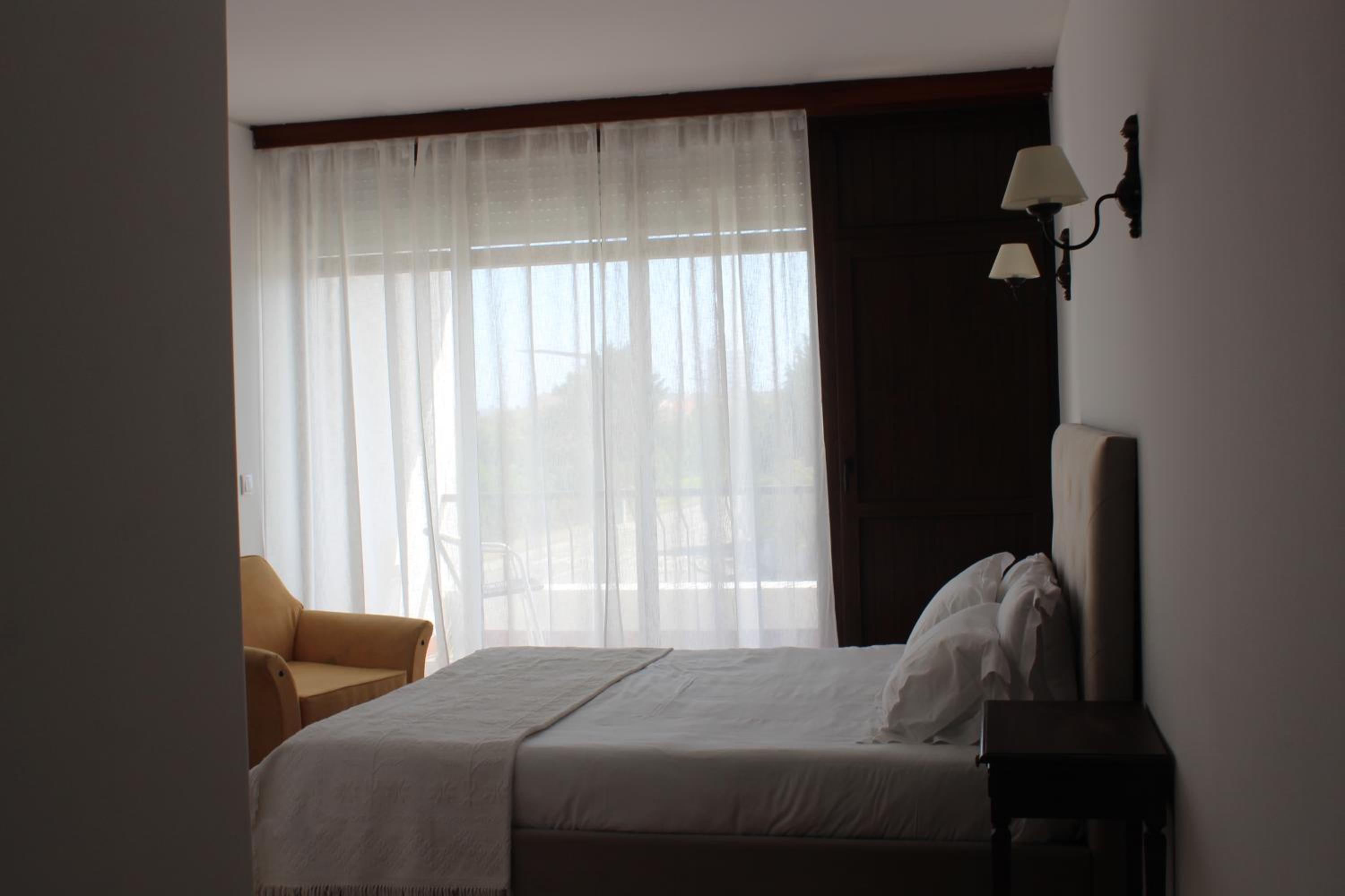 Deluxe Double Room with Balcony - Photo 2