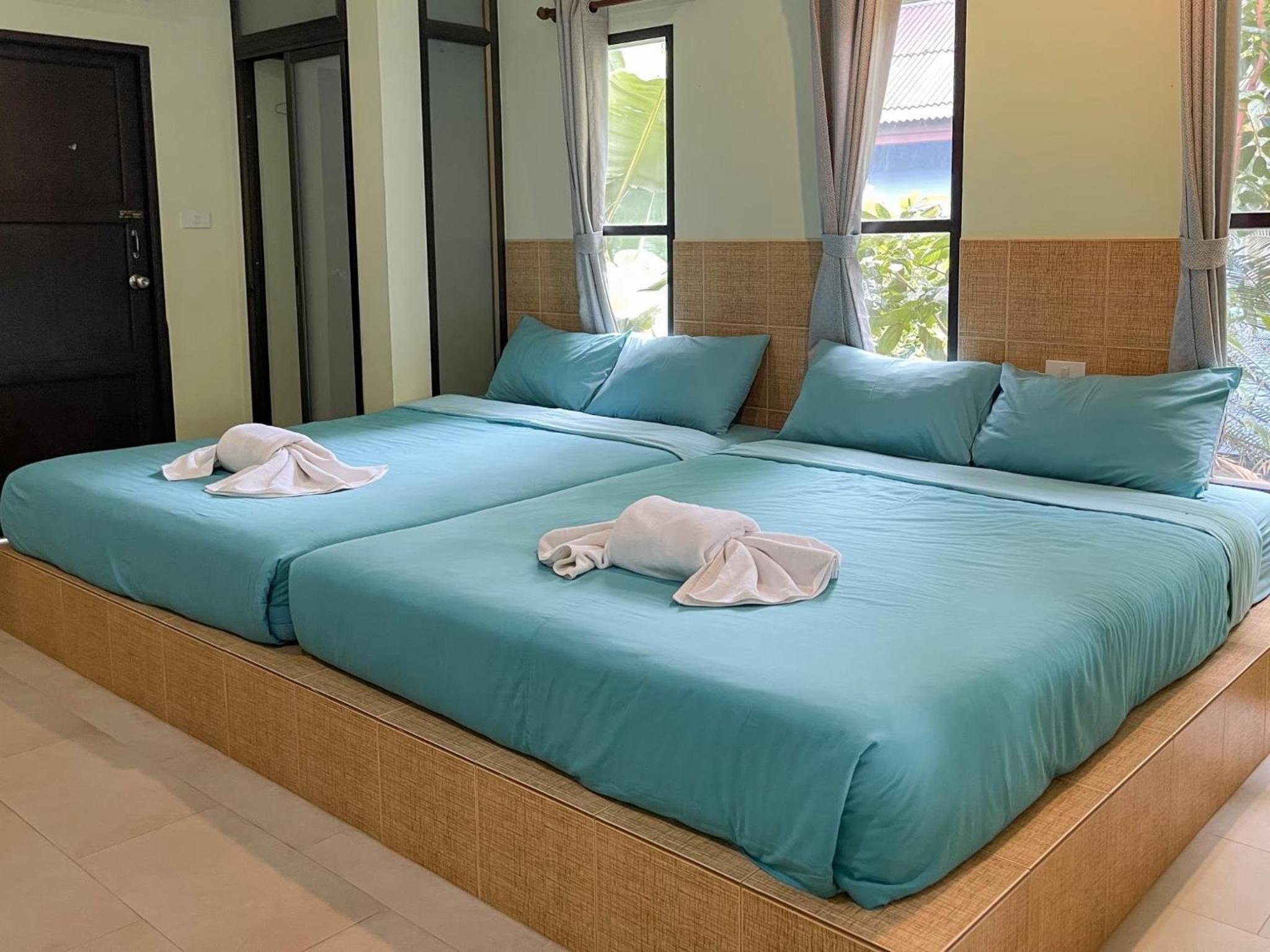 Deluxe Queen Room with Two Queen Beds and Garden View