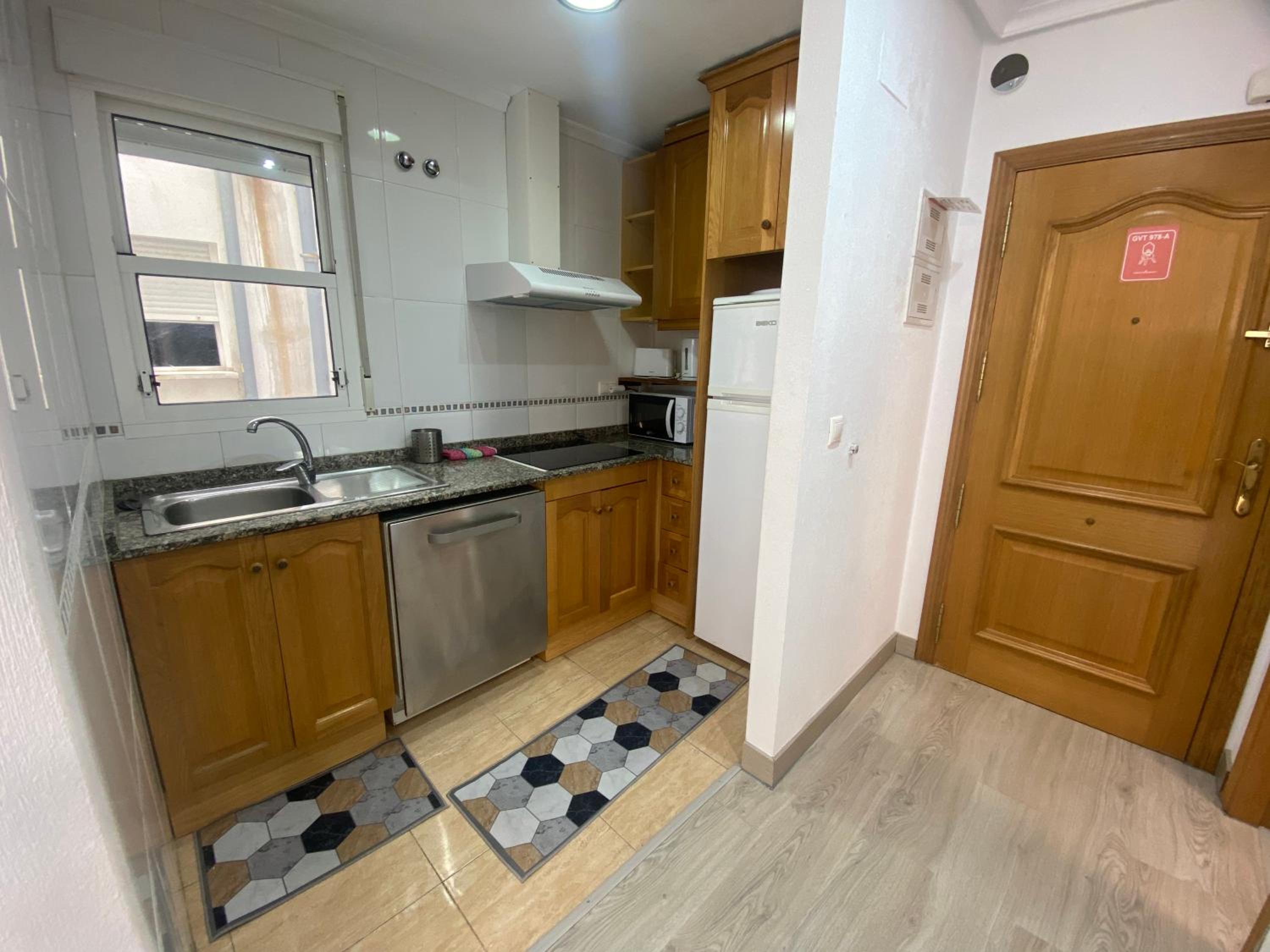 Two-Bedroom Apartment - Photo 41