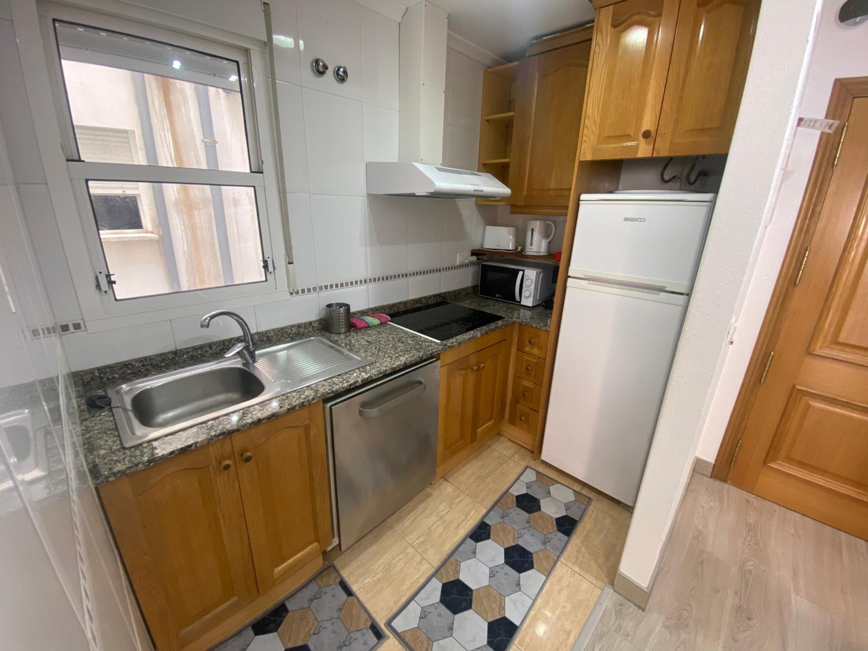 Two-Bedroom Apartment - Photo 40