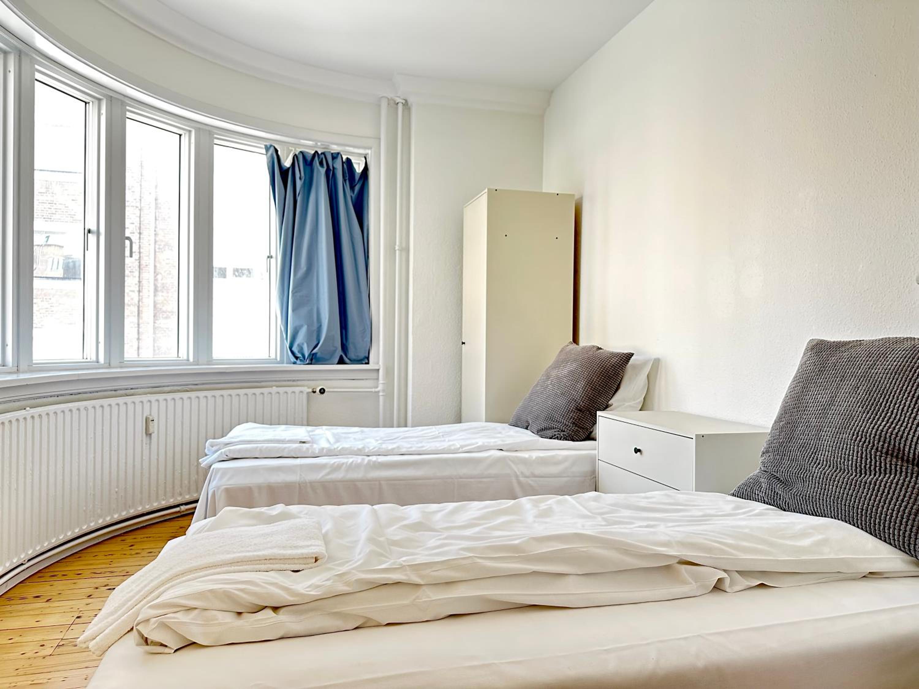 Three-Bedroom Apartment photo 1
