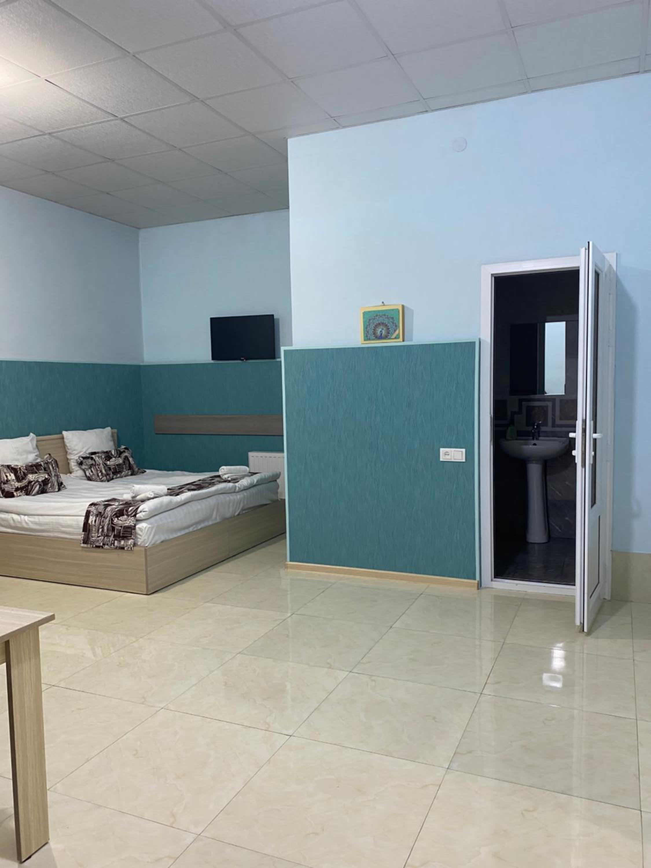 Quadruple Room with Private Bathroom photo 1