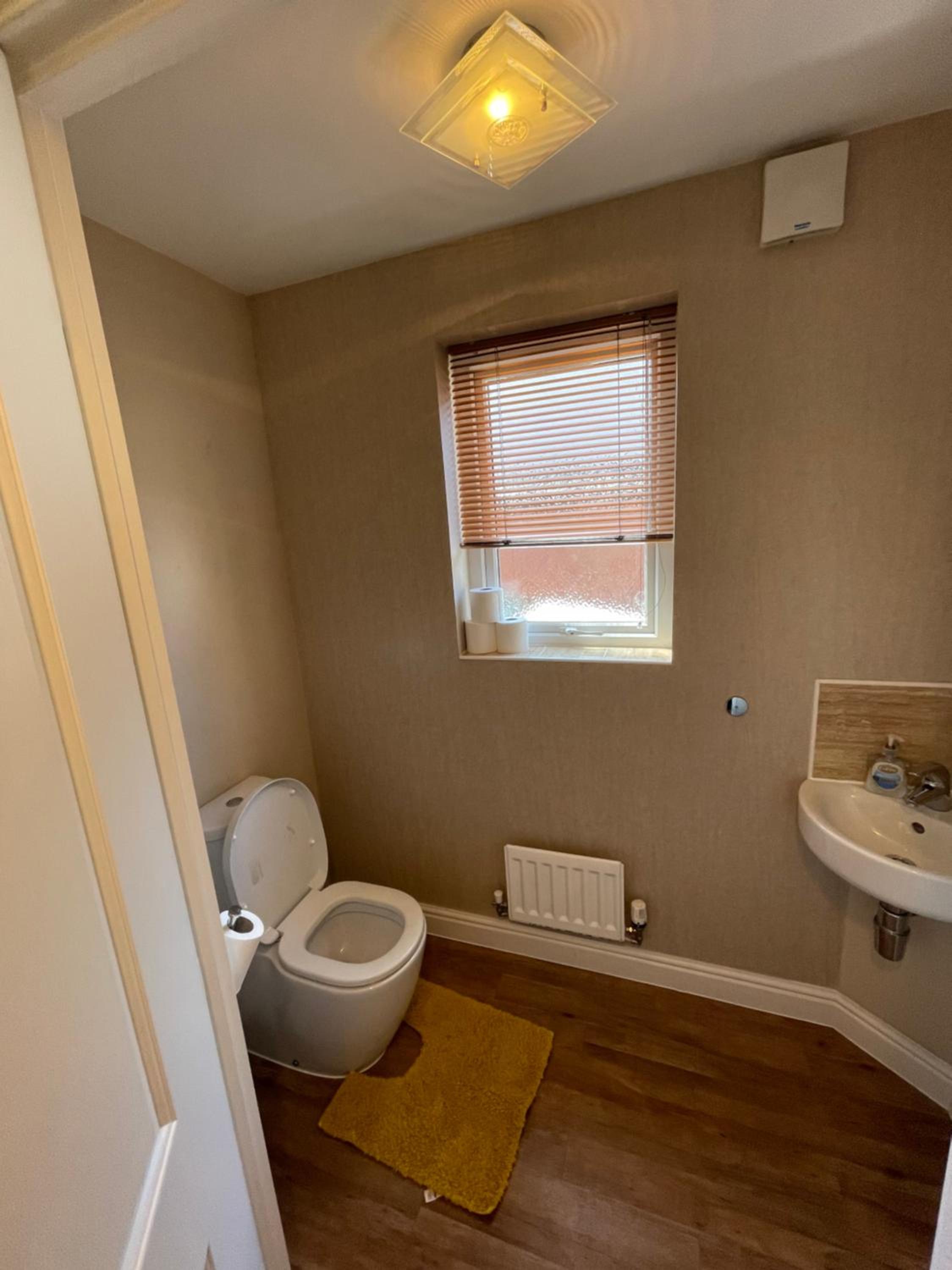 Four-Bedroom House - Photo 36
