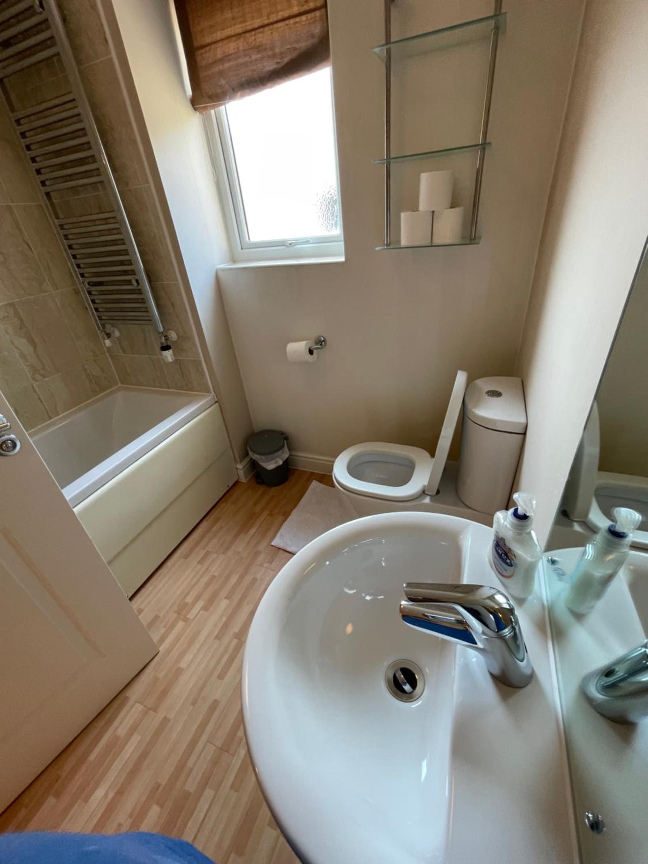 Four-Bedroom House - Photo 21