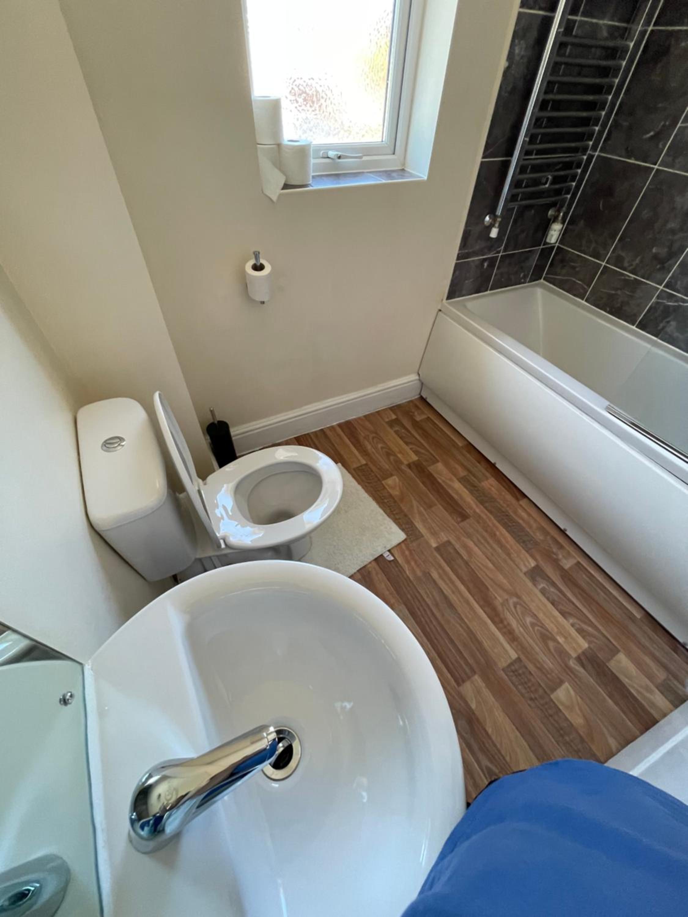 Three-Bedroom House - Photo 5