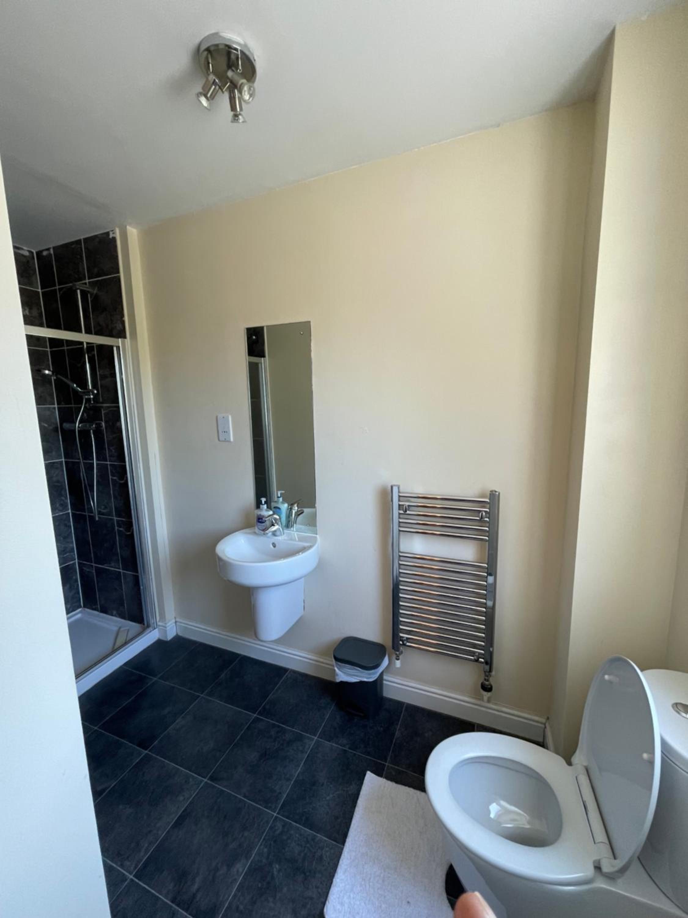 Three-Bedroom House - Photo 2