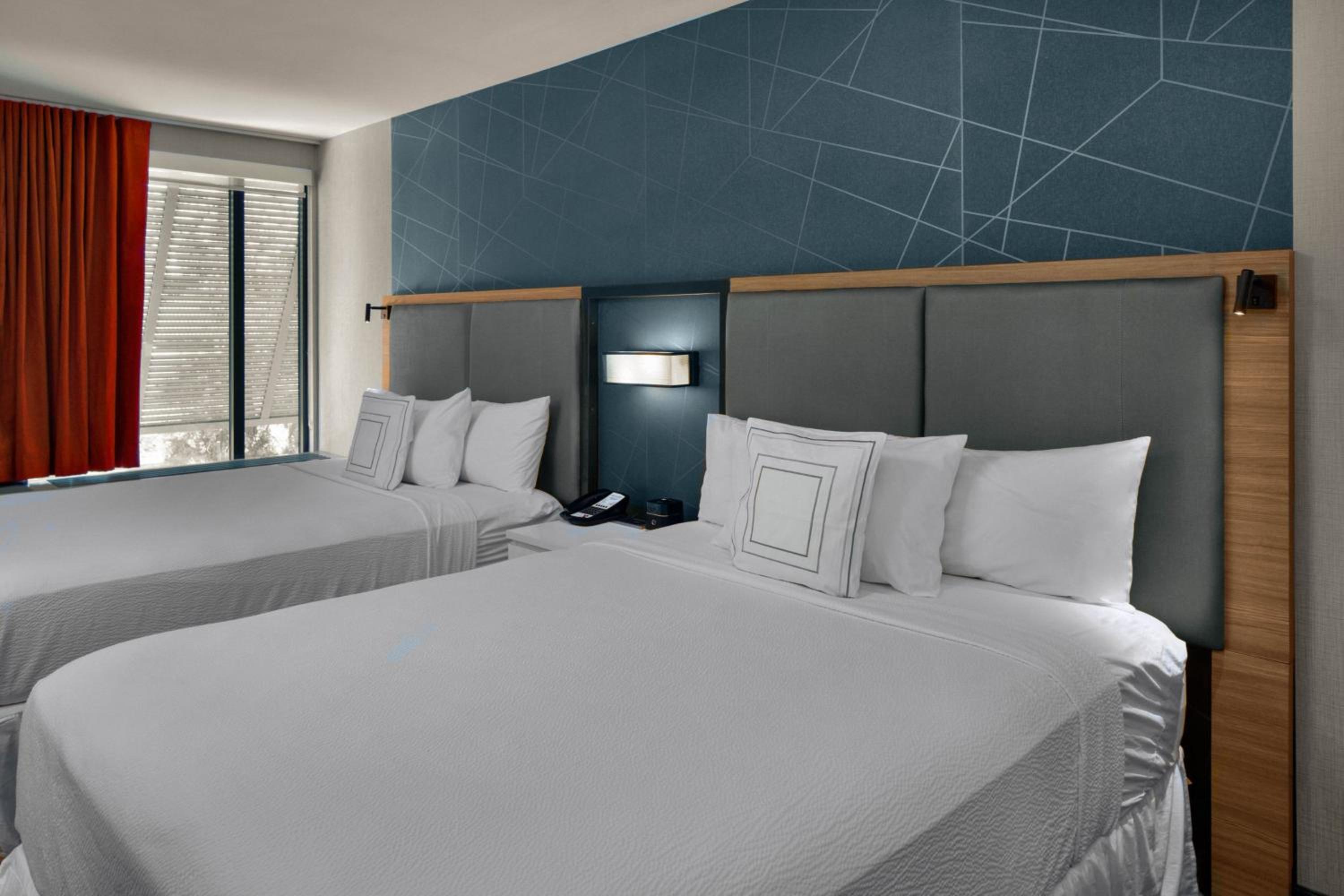 Suite with Two Queen Beds and Trundle Bed - Hearing Accessible - Photo 1