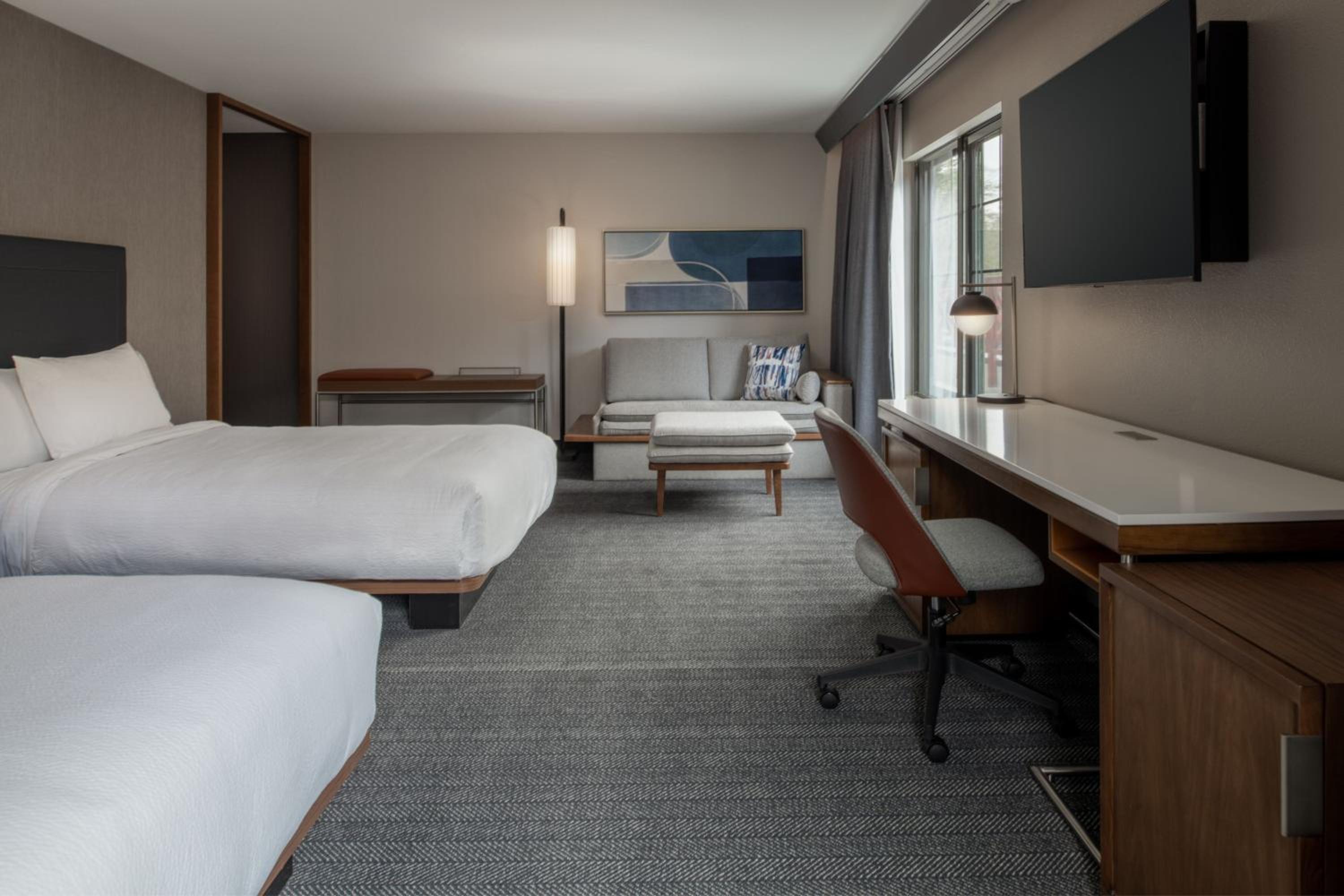 Queen Suite with Two Queen Beds and Sofa Bed - Photo 6