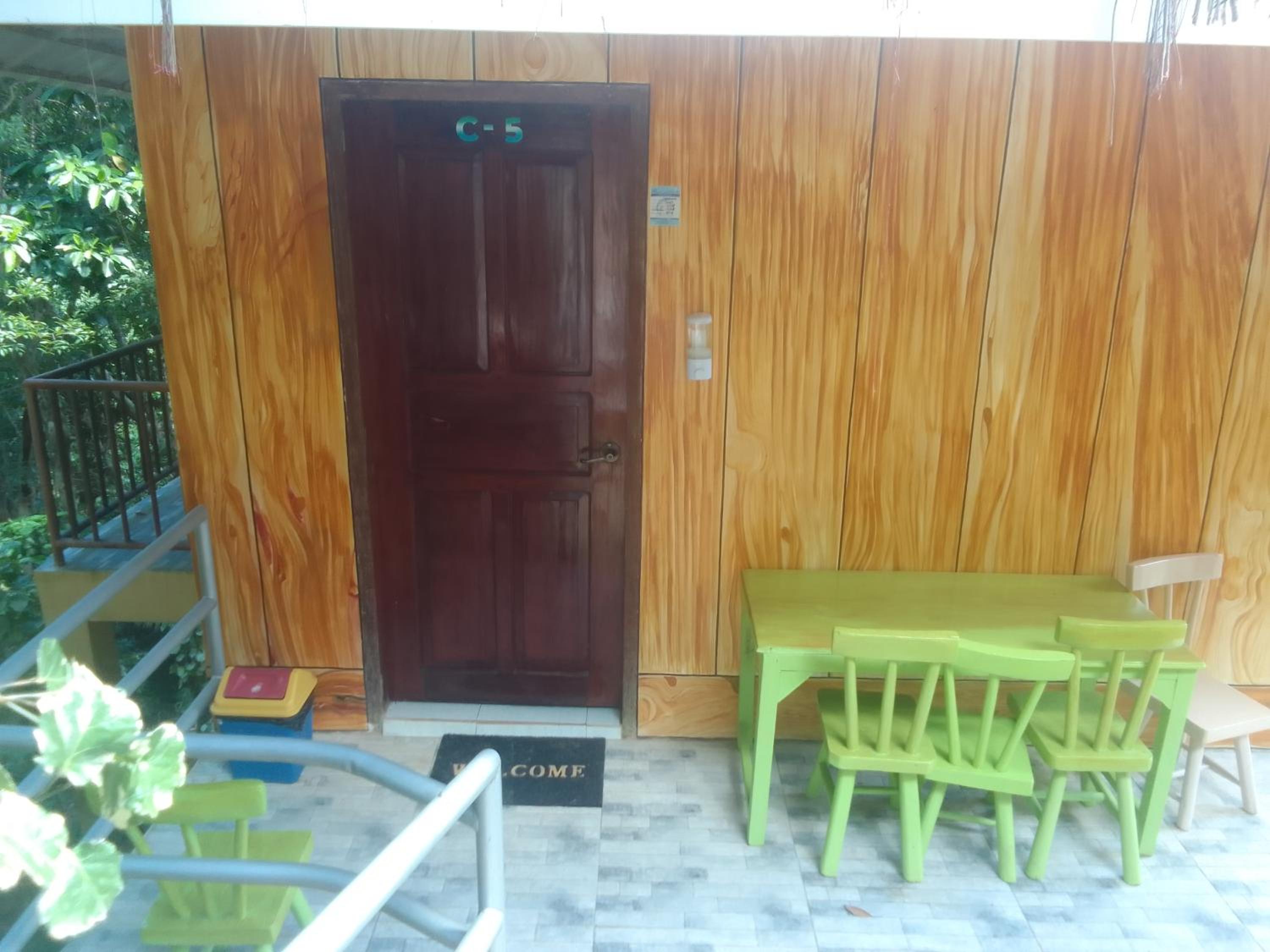 Family Room with Balcony - Photo 8