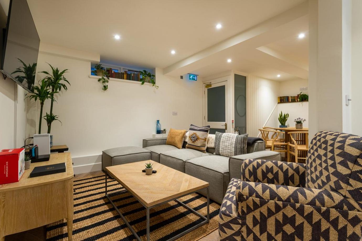 The Den - Four Bedroom - Basement Apartment photo 1