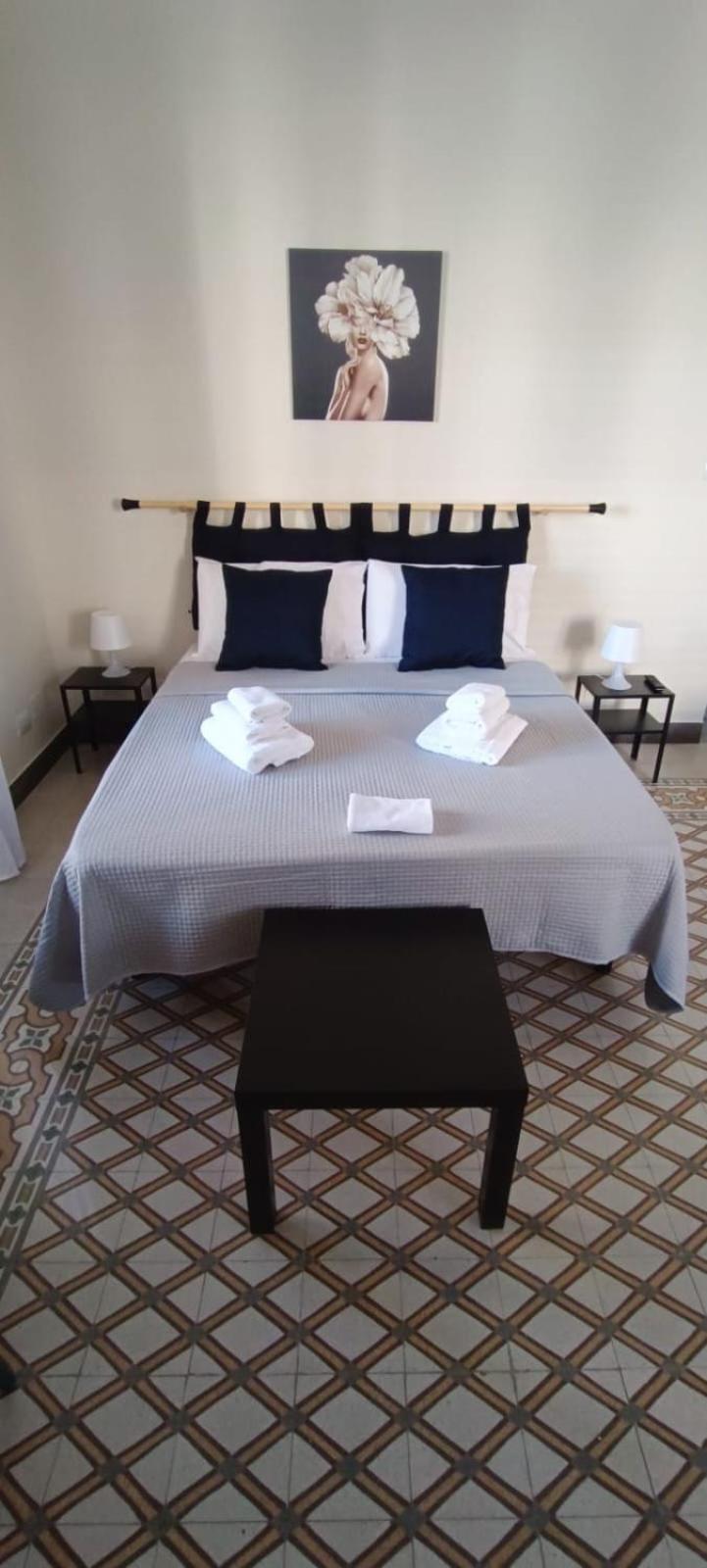 Quadruple Room with Shared Bathroom