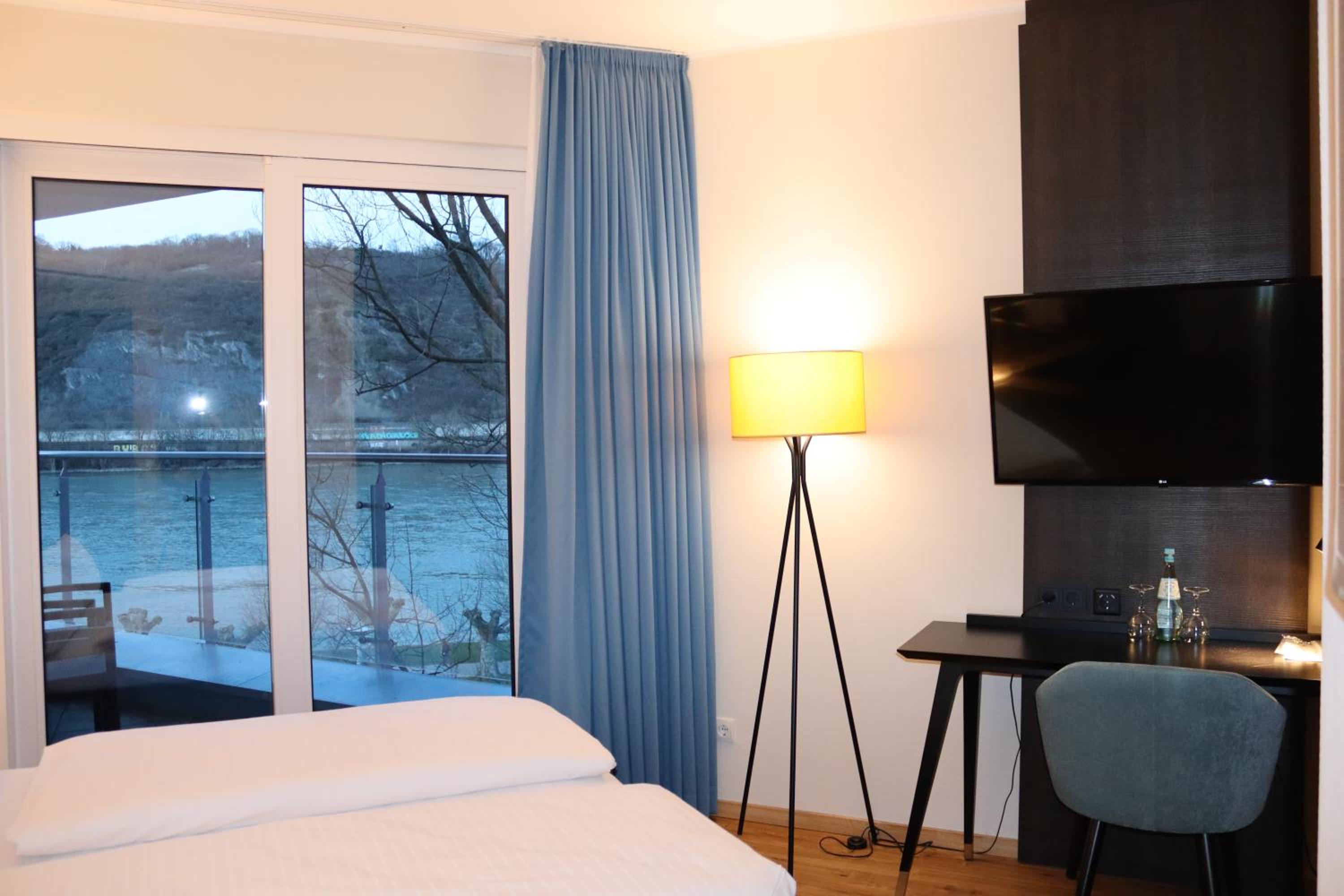 Deluxe Double Room with Balcony and River View - Photo 1