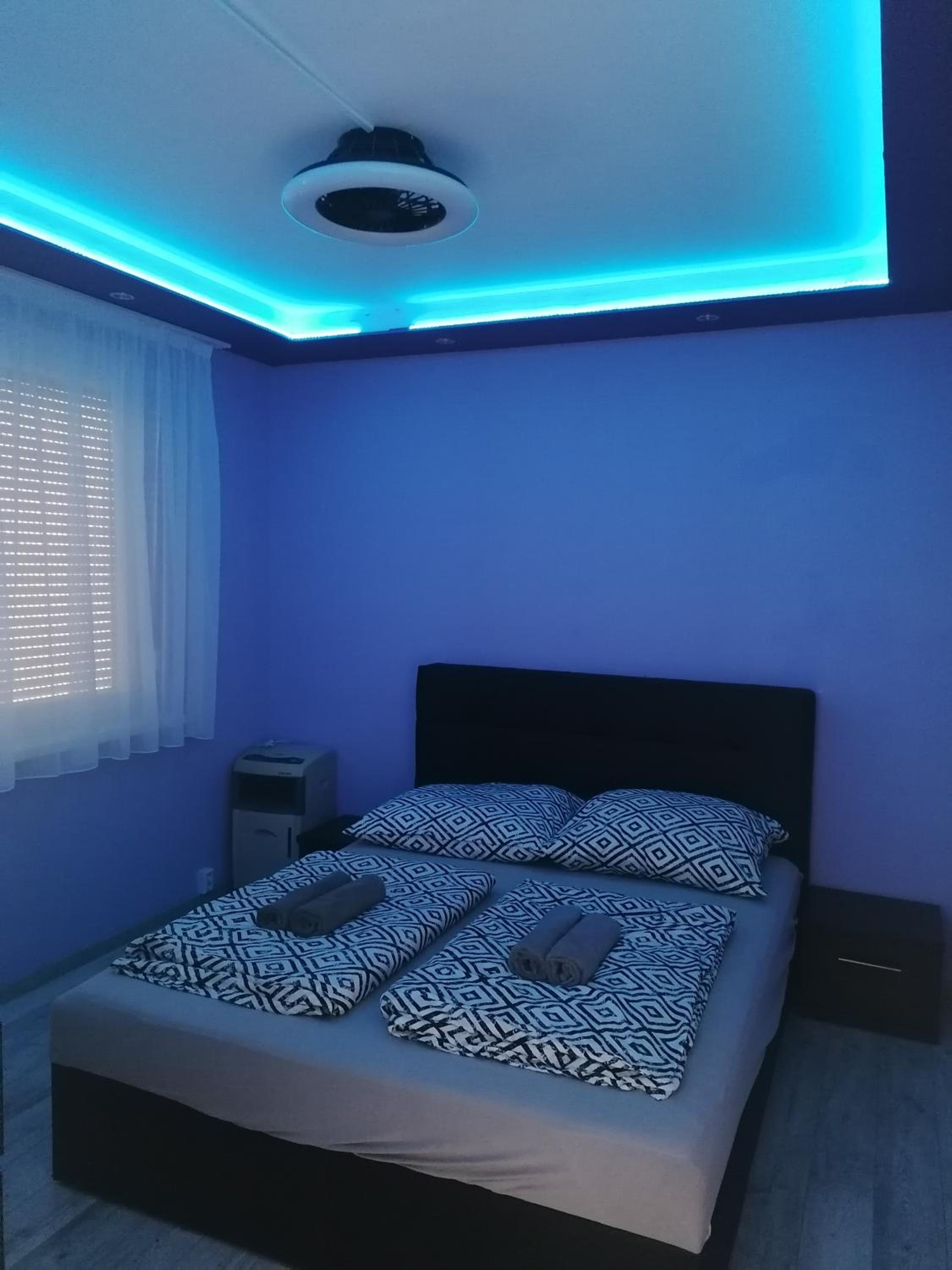 Three-Bedroom Apartment - Photo 13