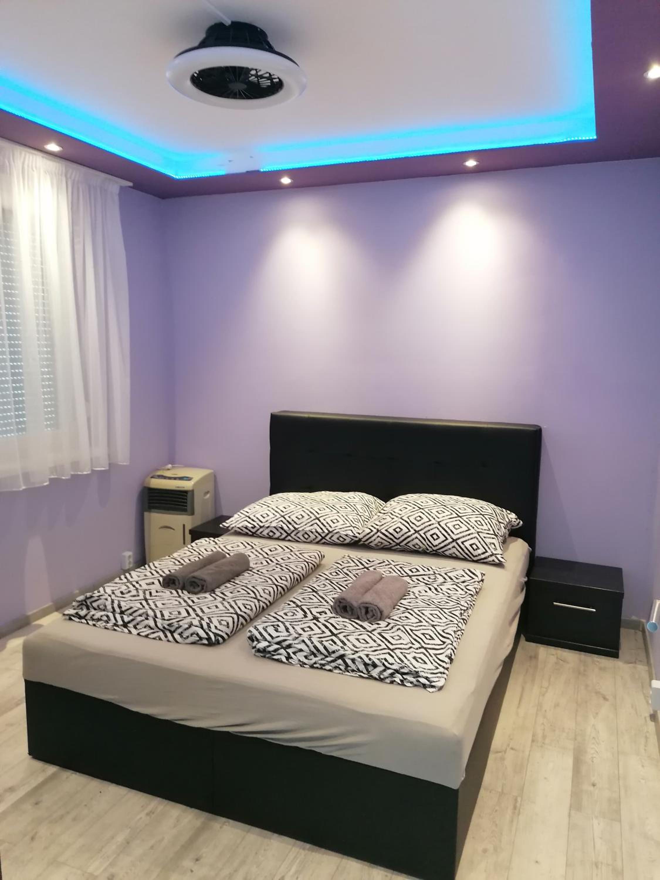 Three-Bedroom Apartment - Photo 12