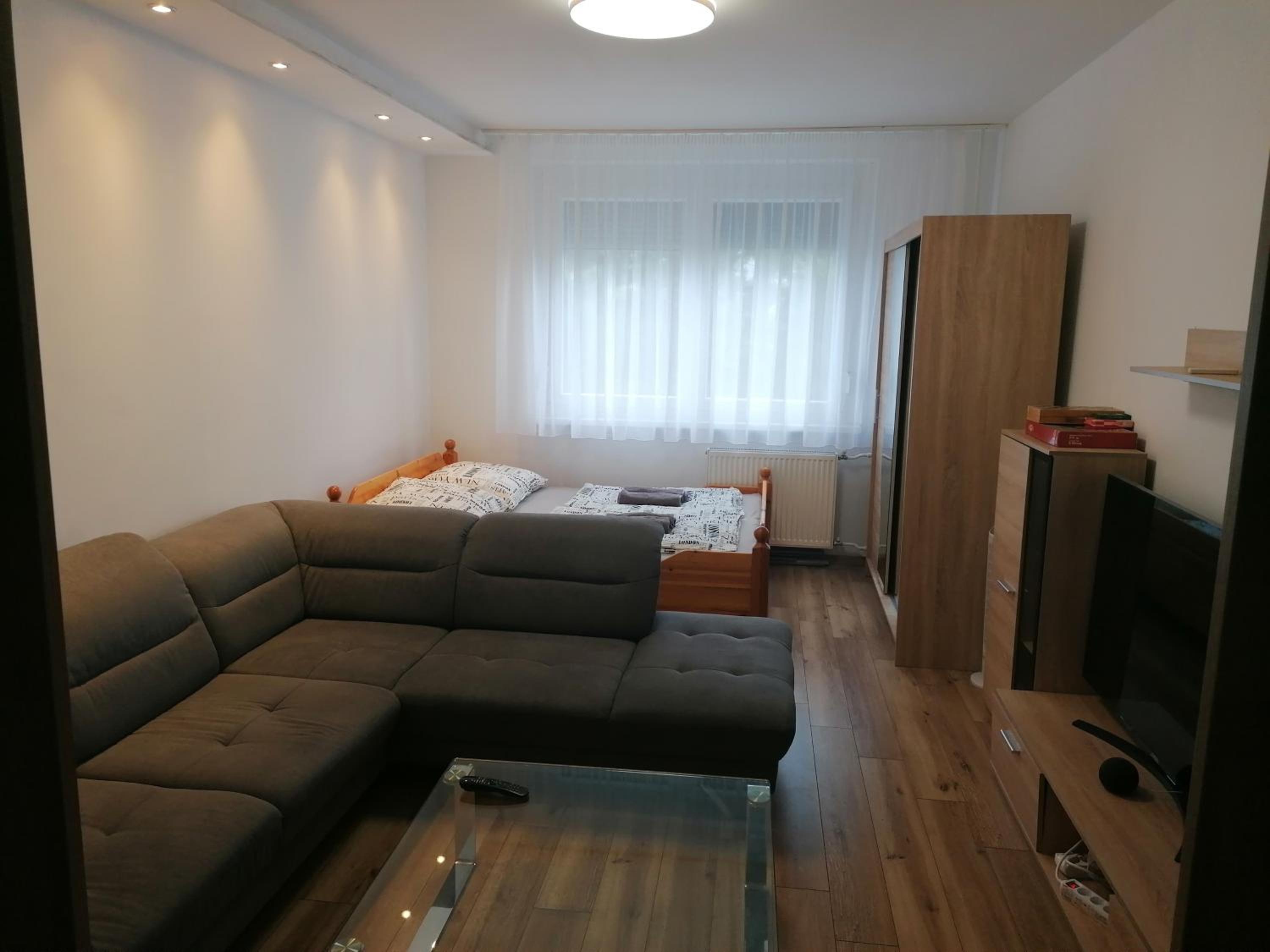 Three-Bedroom Apartment - Photo 10