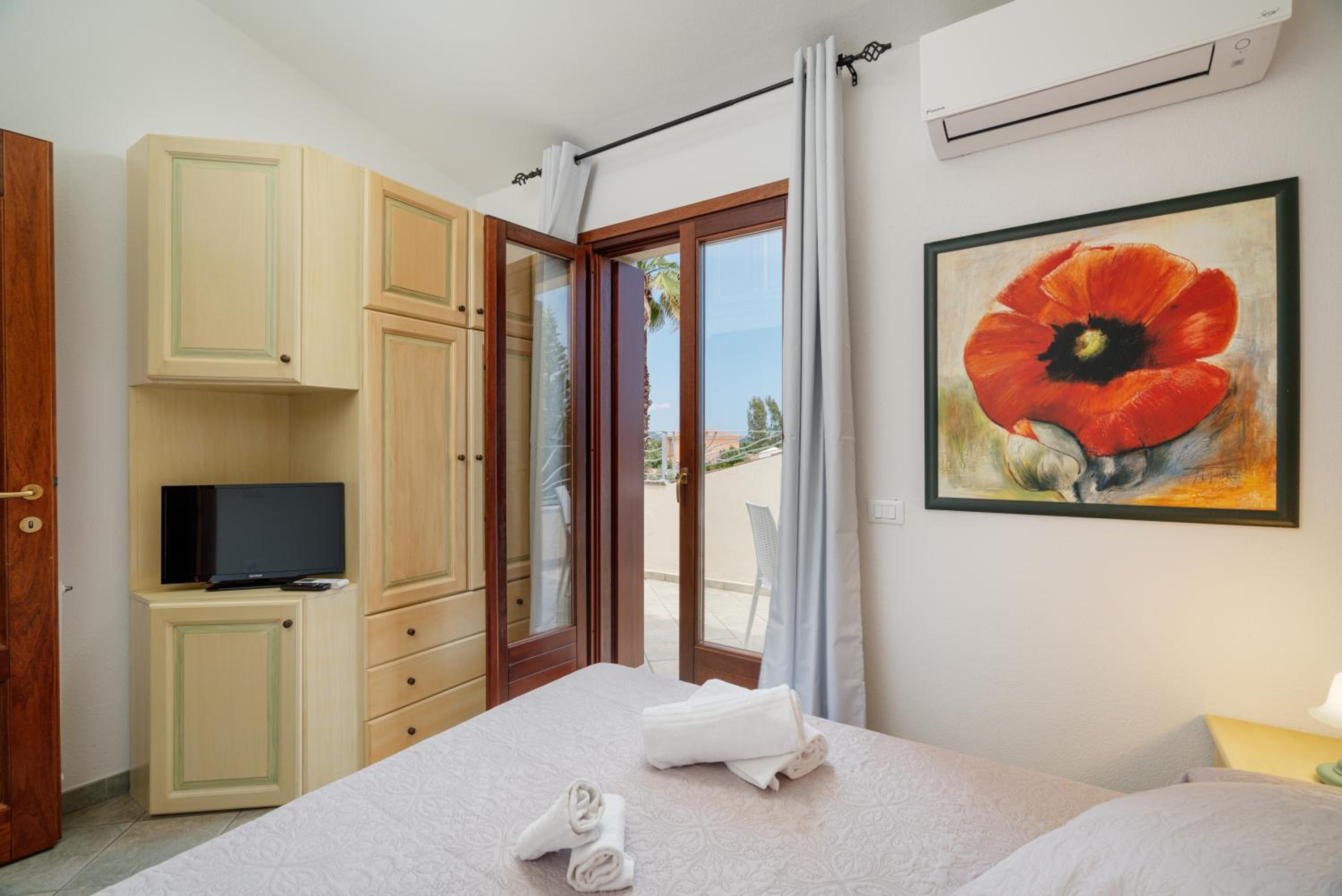 Quadruple Room with Balcony