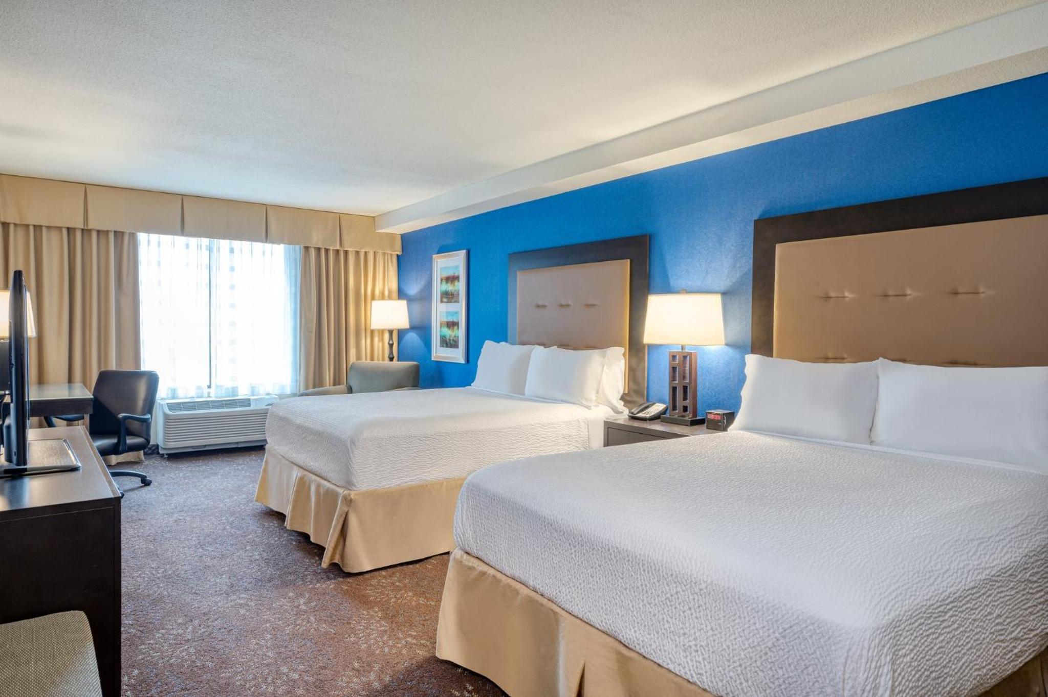 Premium Queen Room with Two Queen Beds - Photo 1