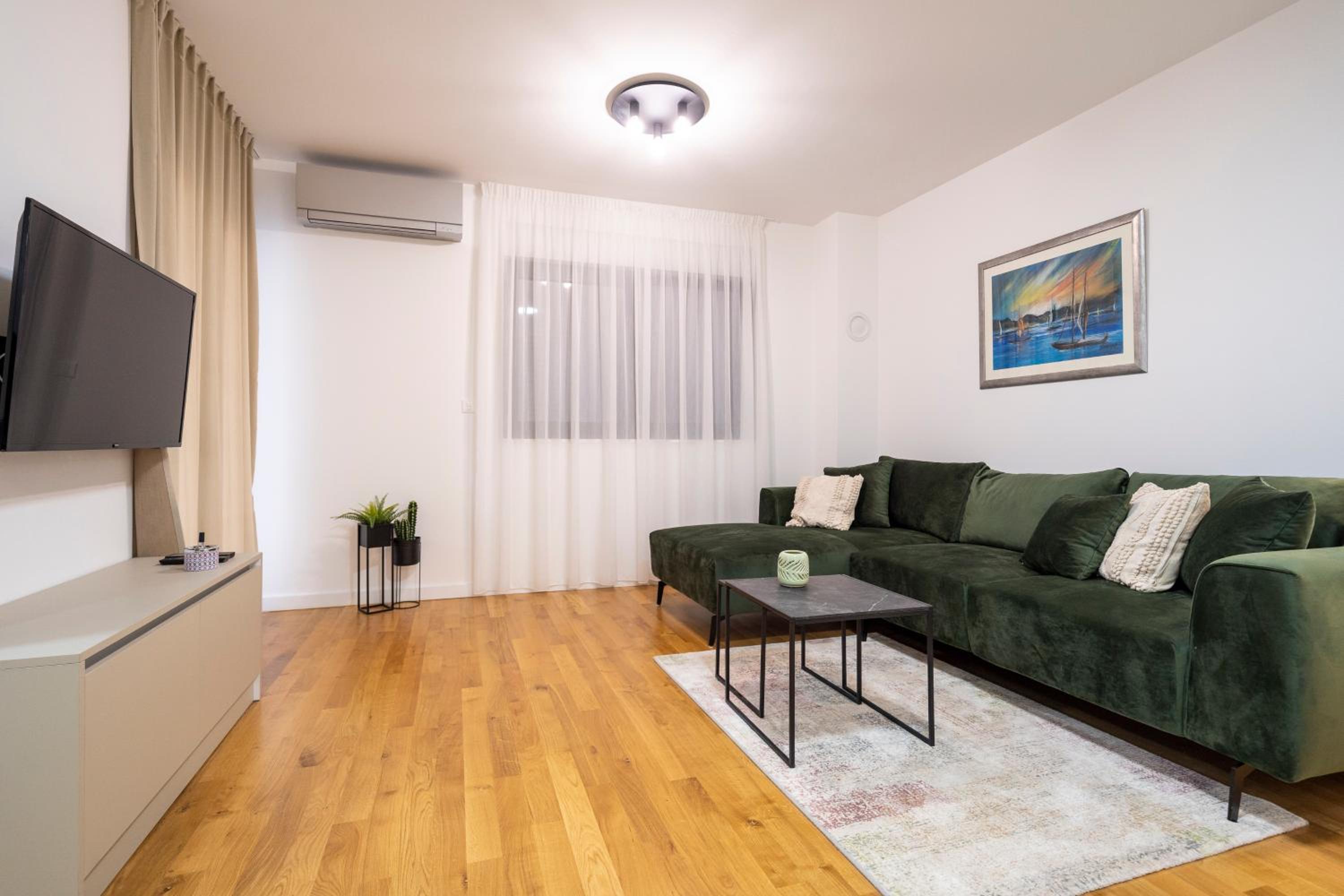  Two-Bedroom Apartment with Balcony and City View - First Floor photo 3