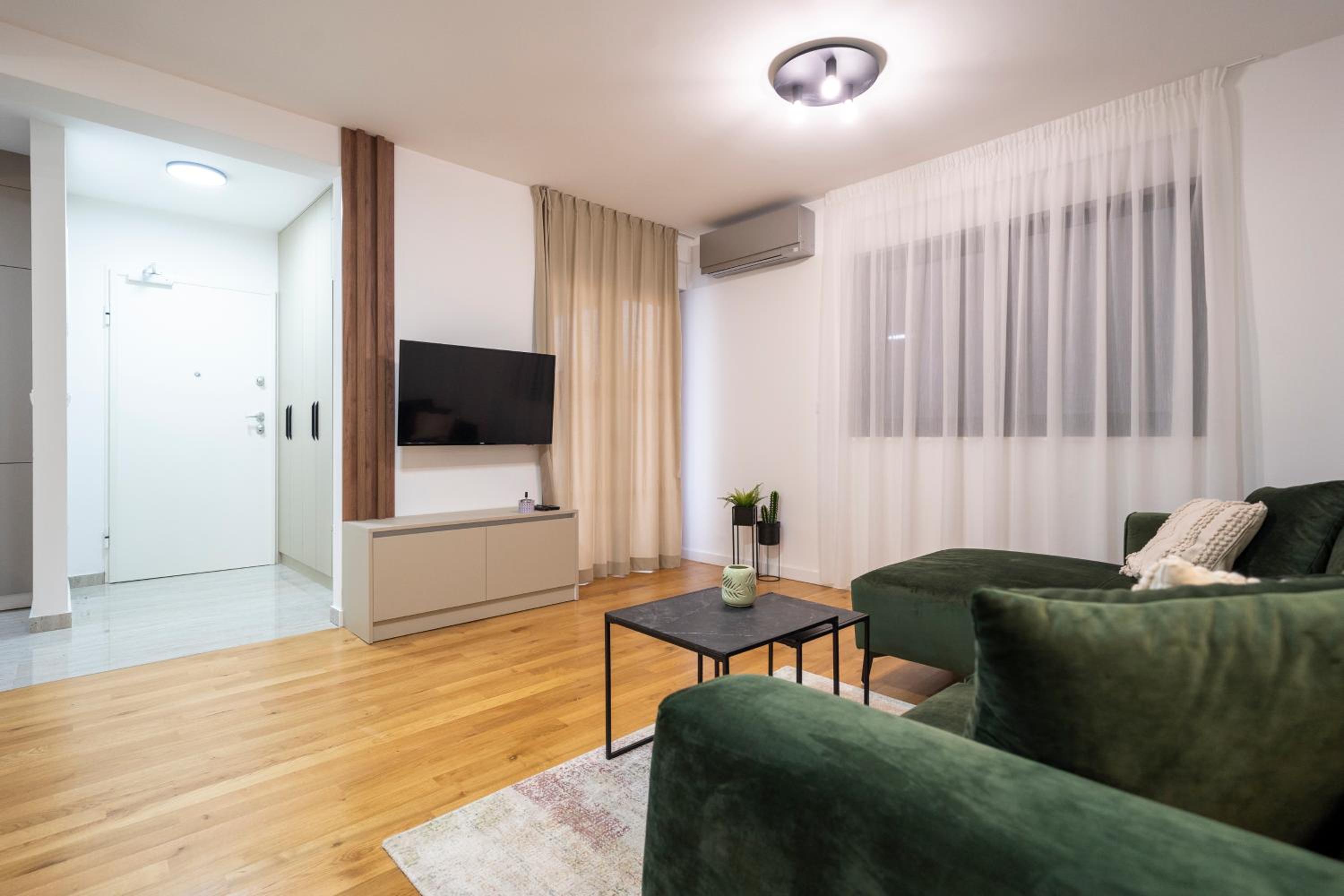  Two-Bedroom Apartment with Balcony and City View - First Floor photo 1