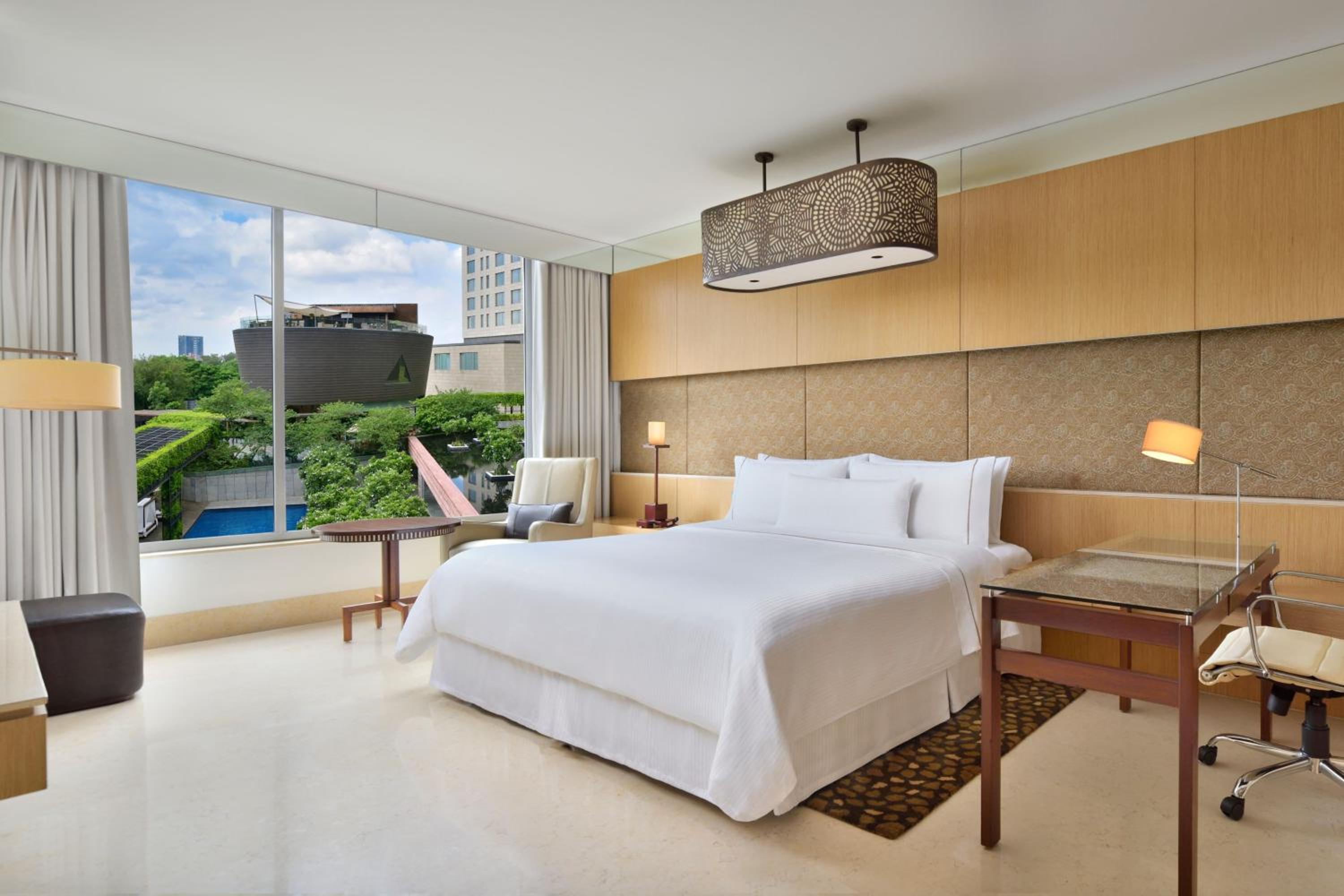 Premium King Room Pool View - Photo 1