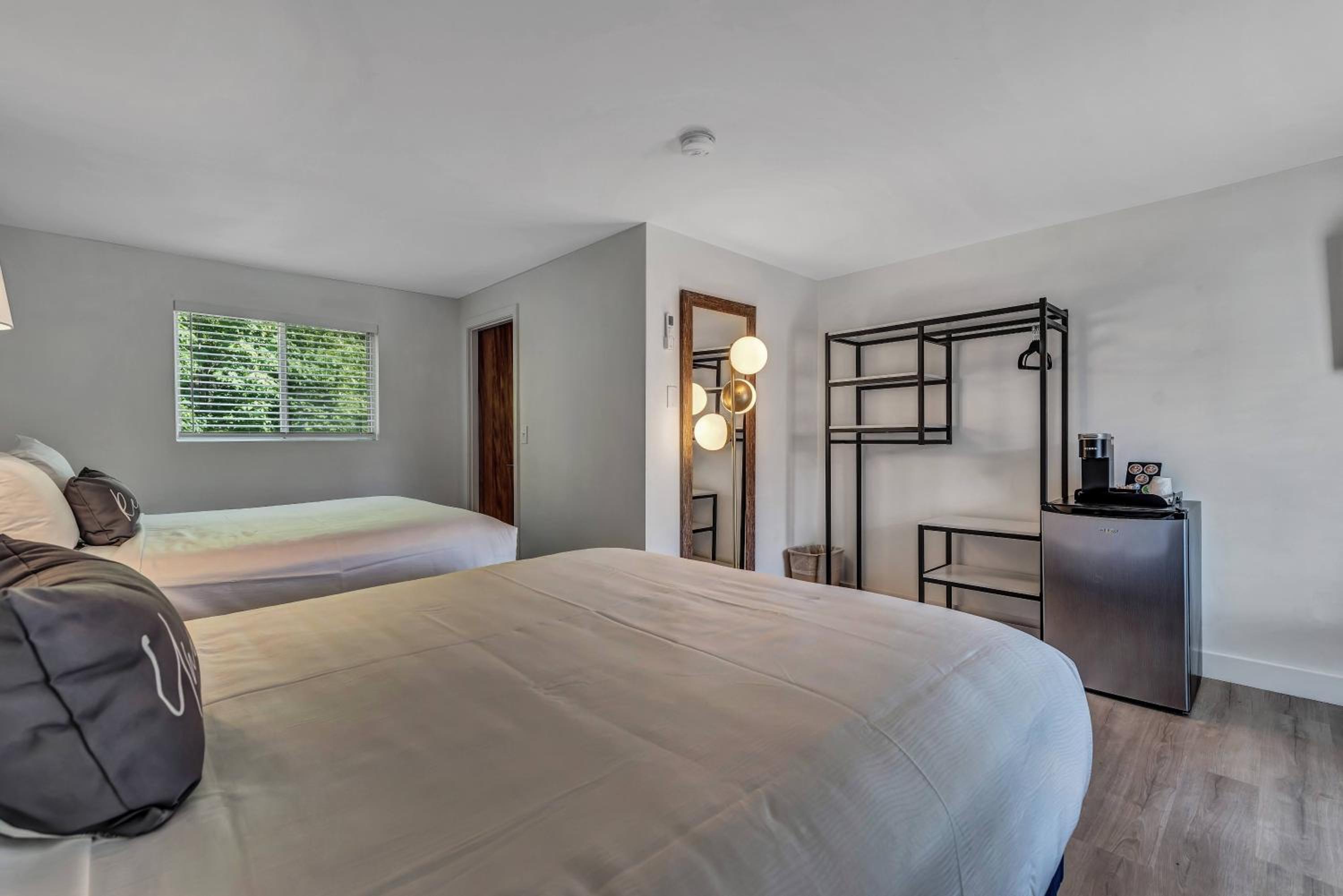 Room with Two Queen Beds - No Pets - Photo 1