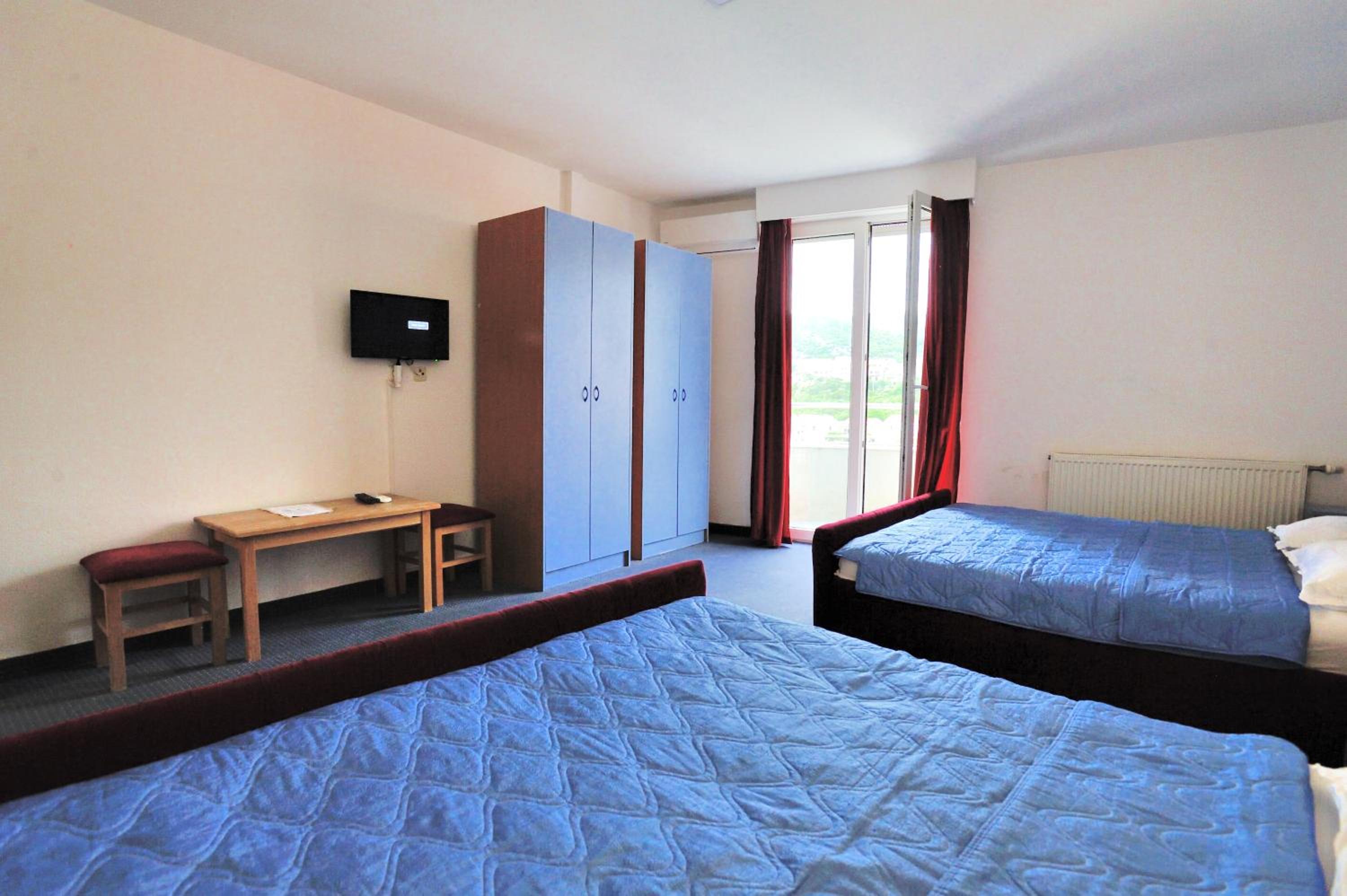 Quadruple Room with Balcony photo 3