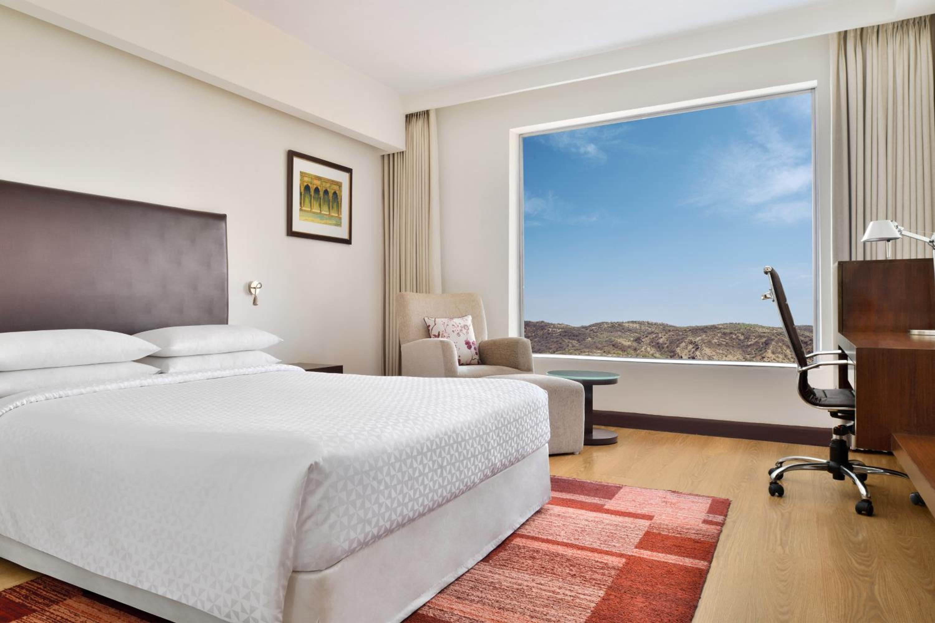 Deluxe King Guest Room ( 20% Dis on SPA, Laundry and Food & Soft Beverages only at The Eatery, Credit Meal of INR 1000/- in a the stay on Minimum bill amount of INR 2500/-)
