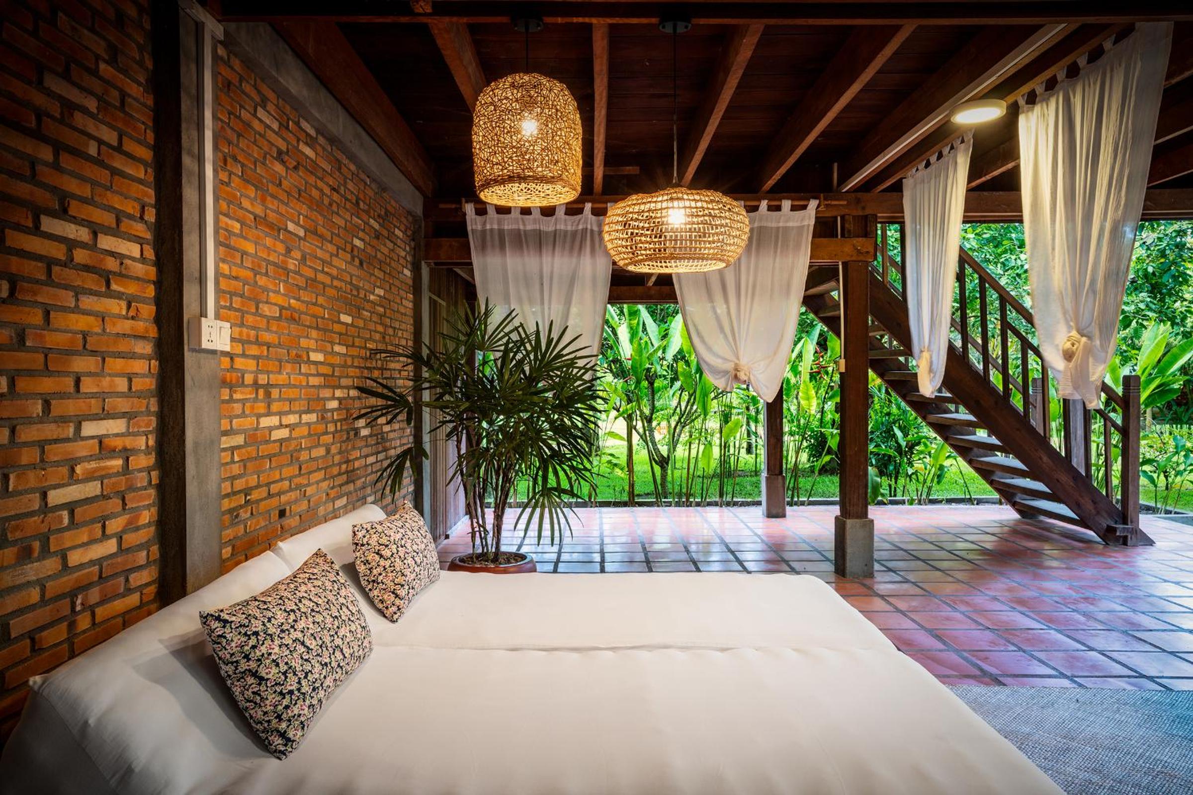 Deluxe Khmer Bungalows - Photo 4