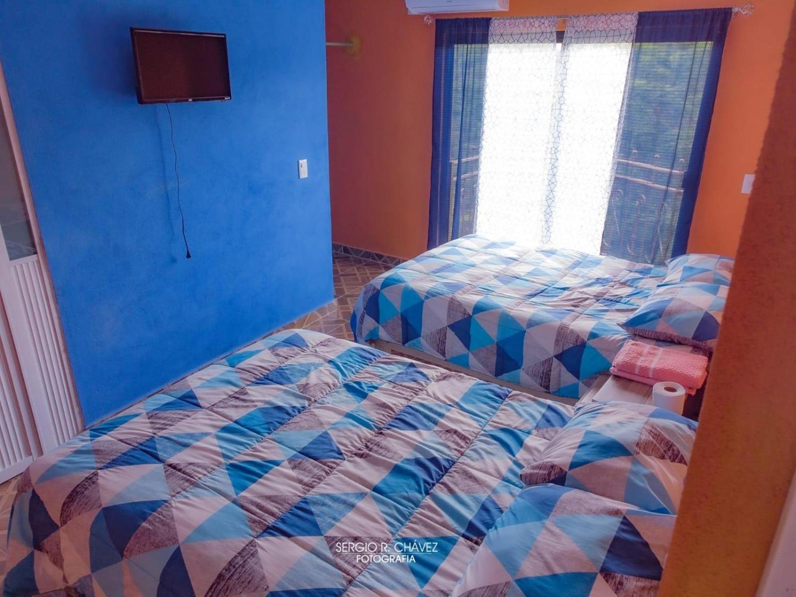 Deluxe Queen Room with Two Queen Beds - Photo 8