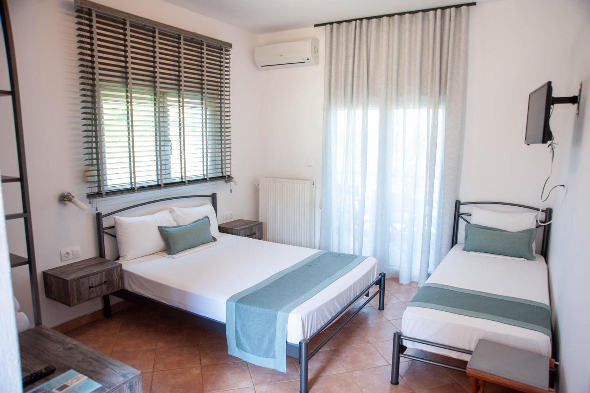 Deluxe Triple Room - Photo 19