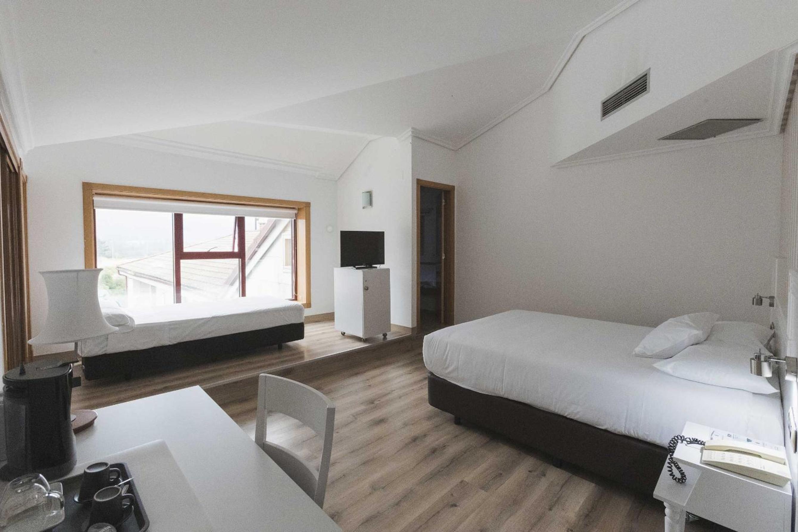 Habitación familiar (3 adultos) Habitación familiar (3 adultos)