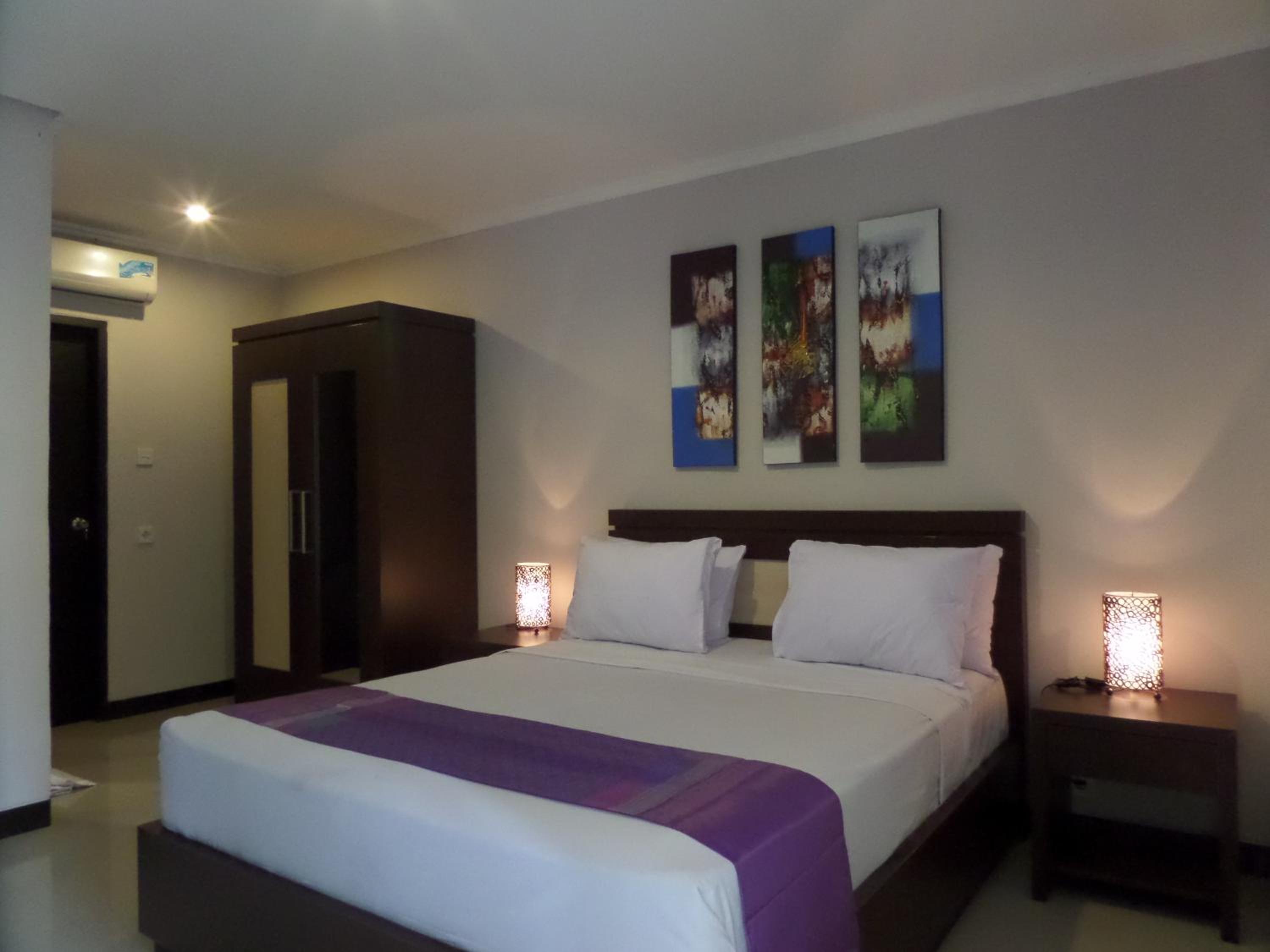 Deluxe Room - Photo 1