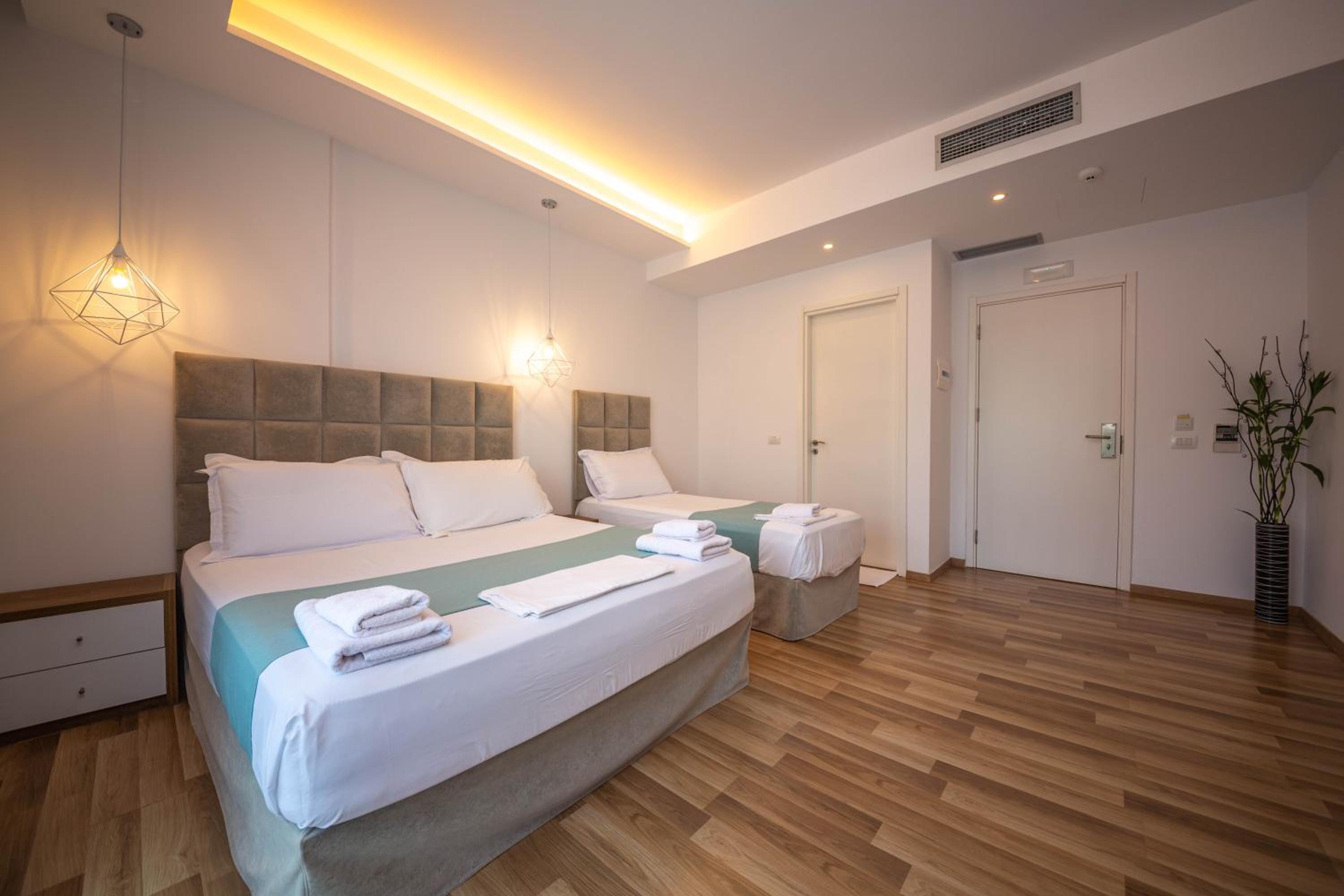 Deluxe Triple Room with Balcony