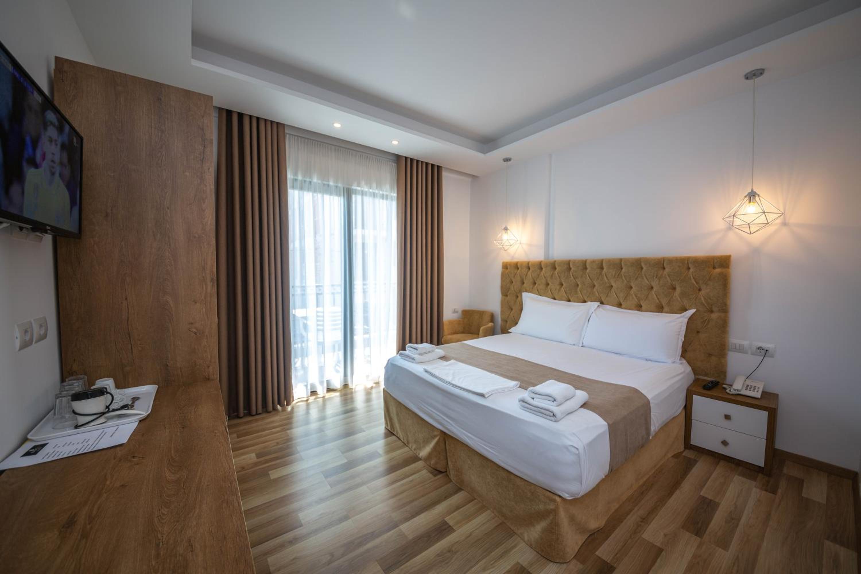 Deluxe Quadruple Room with Balcony