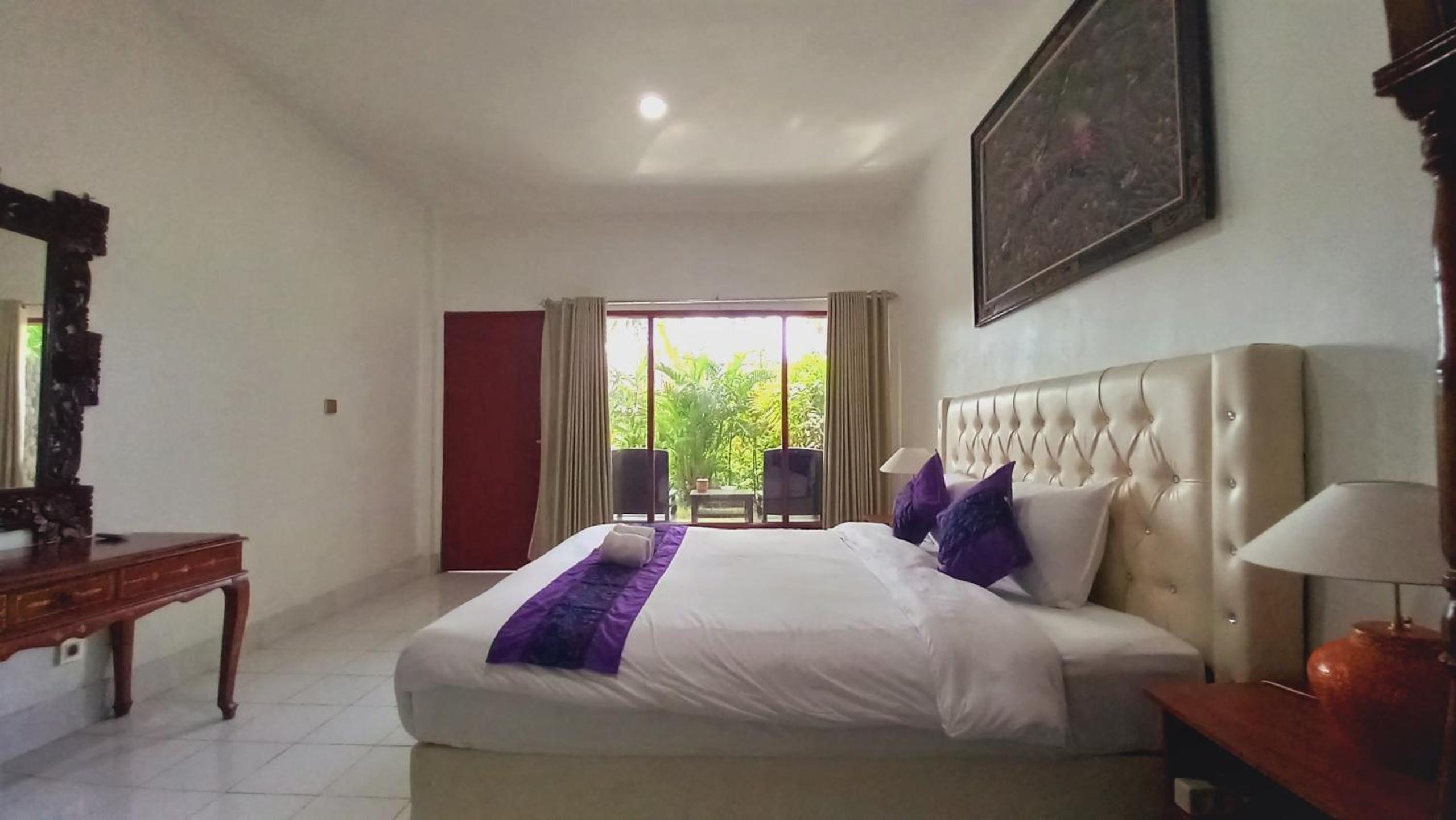 Deluxe Room - Photo 13