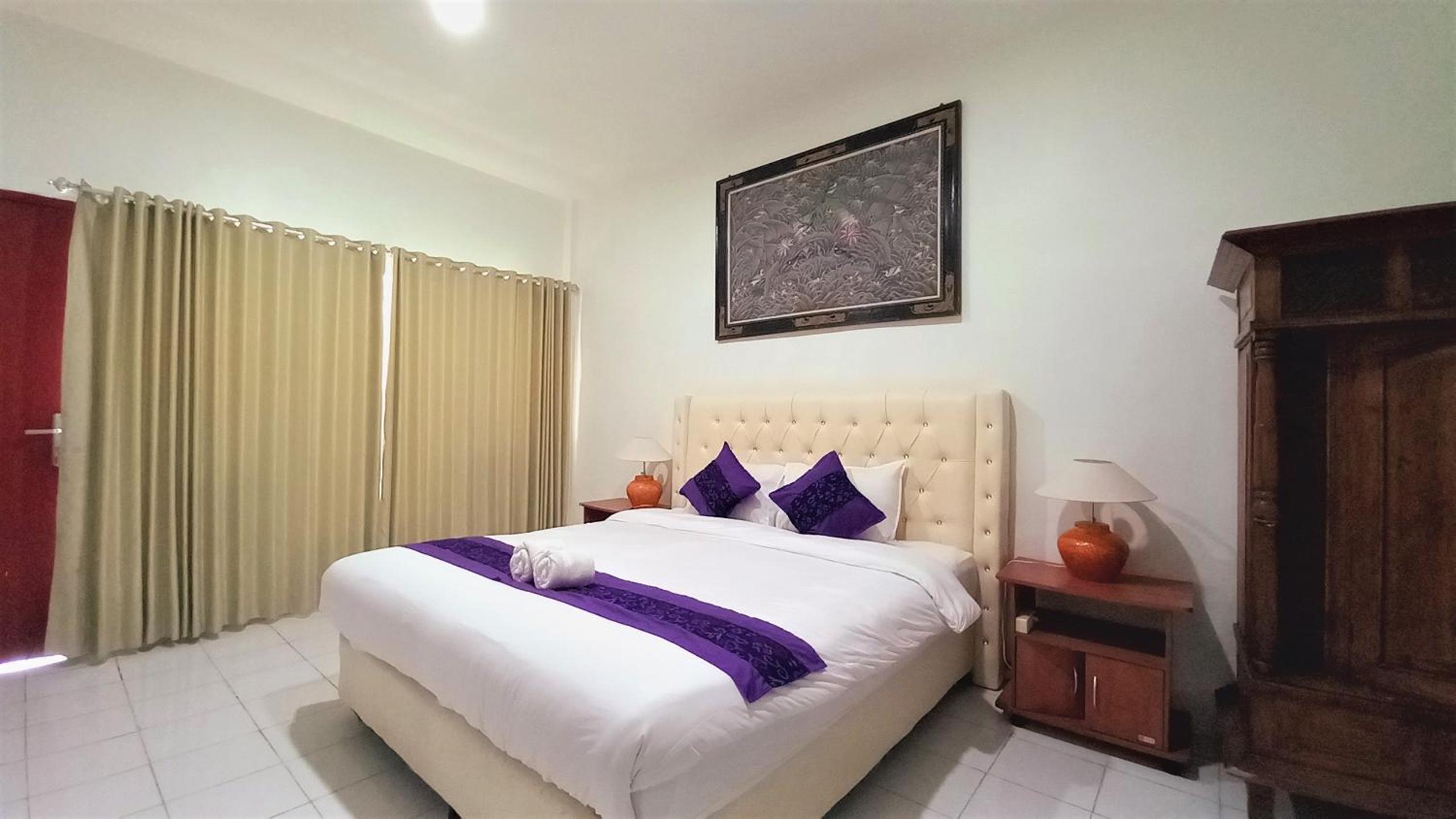 Deluxe Room - Photo 12