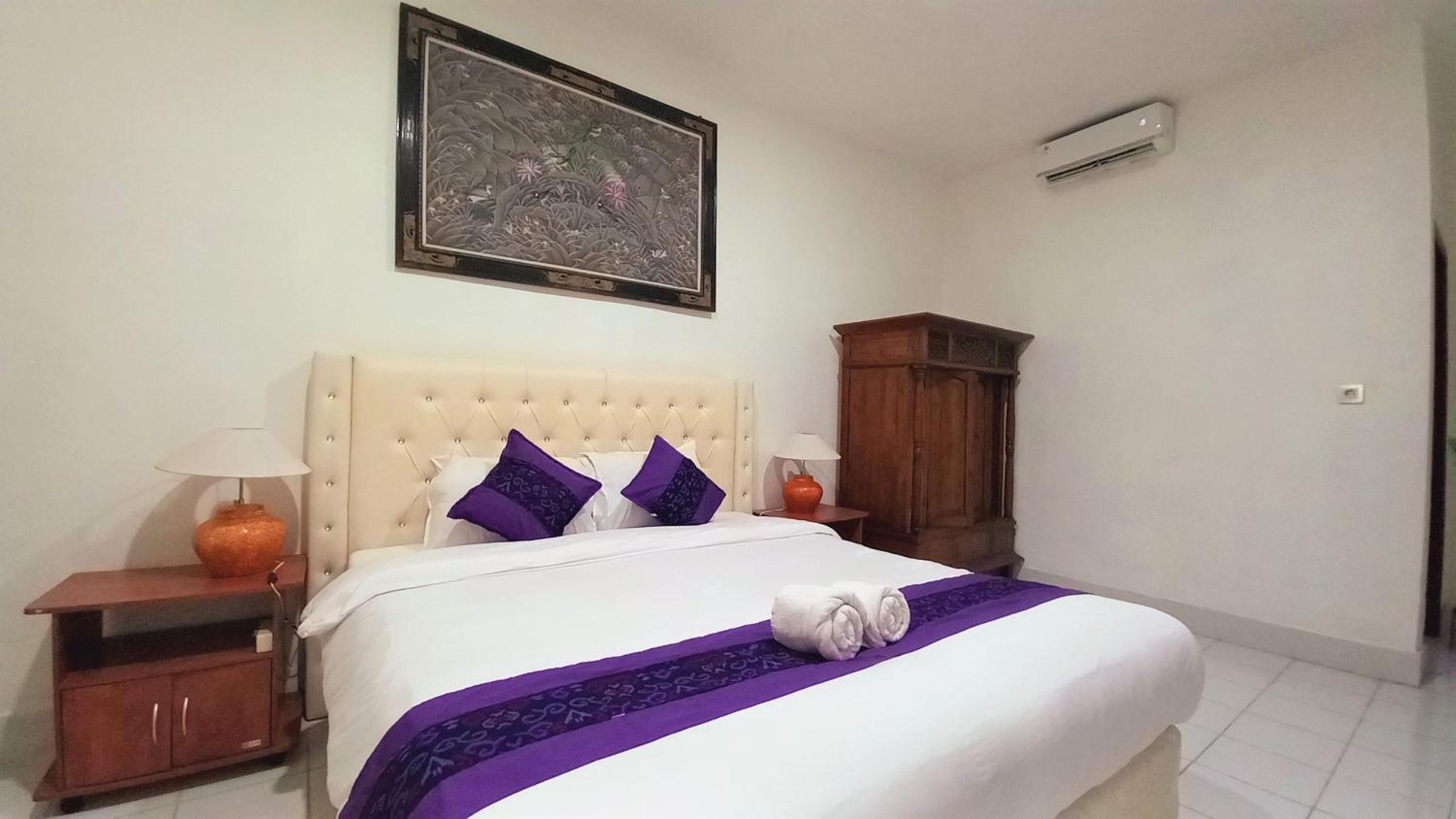 Deluxe Room - Photo 11