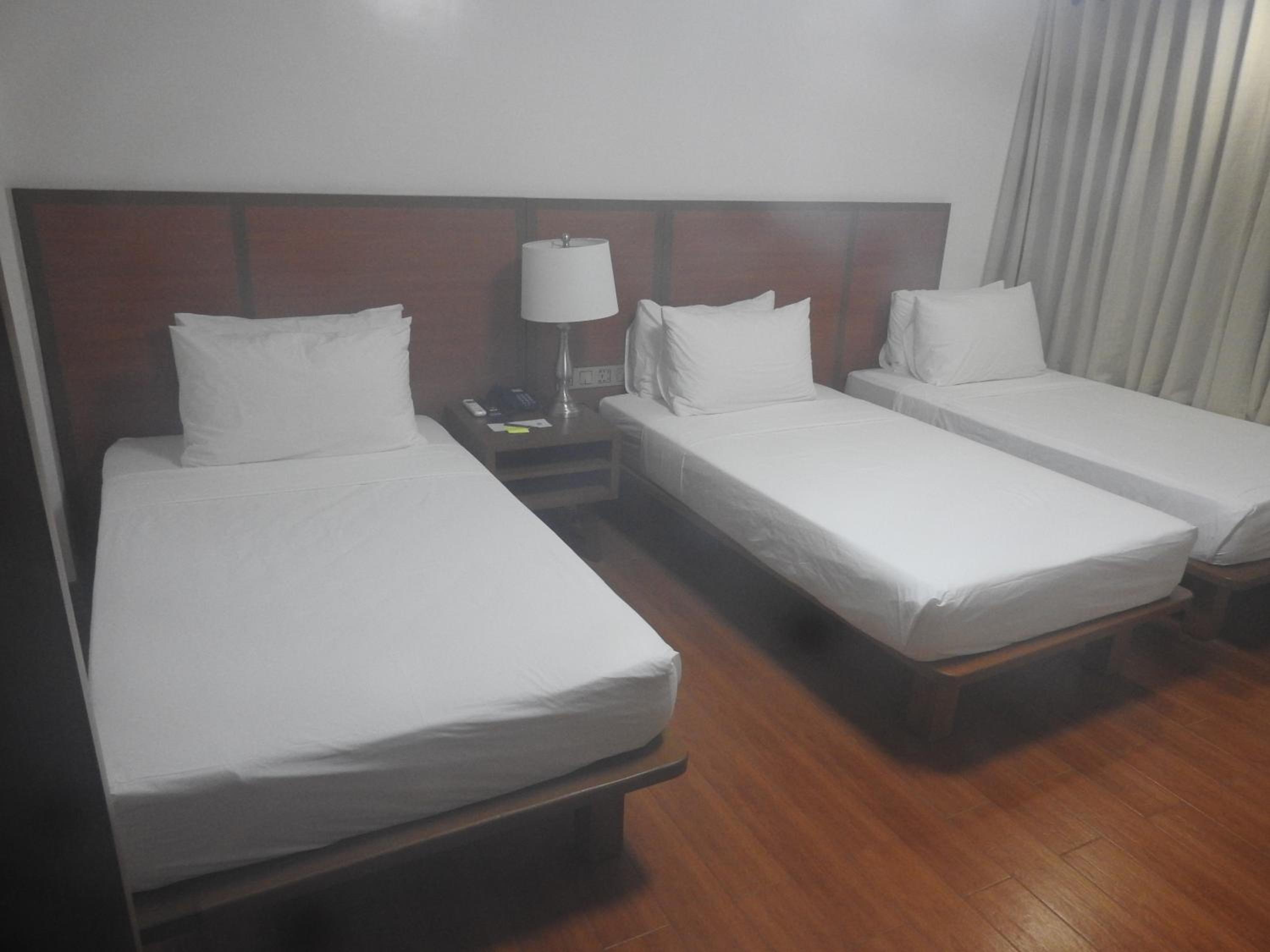 Deluxe Triple Room - Photo 6